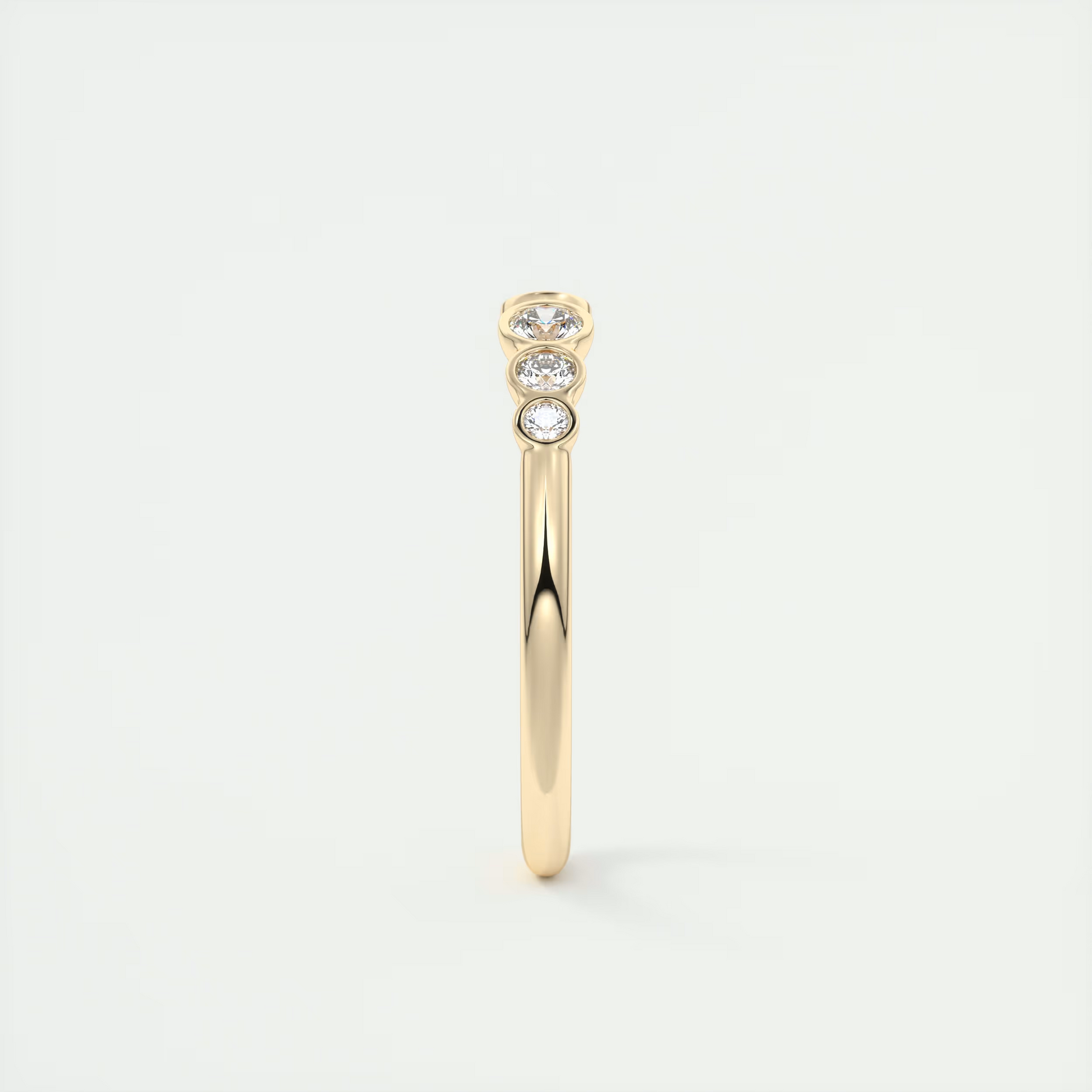 Graduated Open Bezel Wedding Band (0.20 TCW)