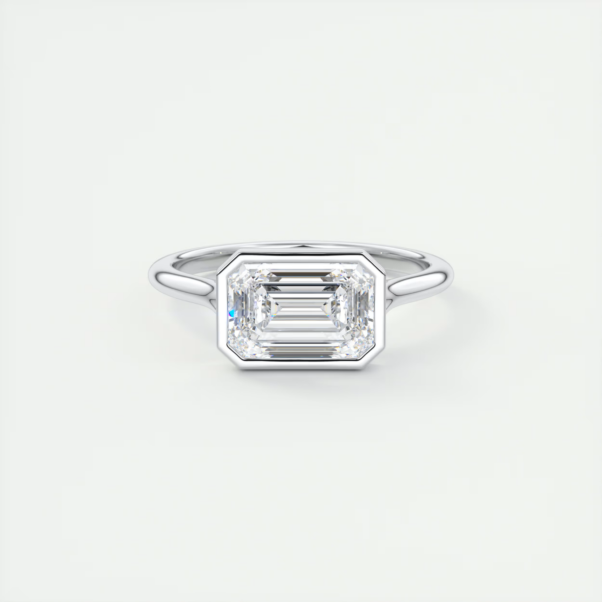 2 ct Emerald Flush Stacking East-West Bezel Solitaire