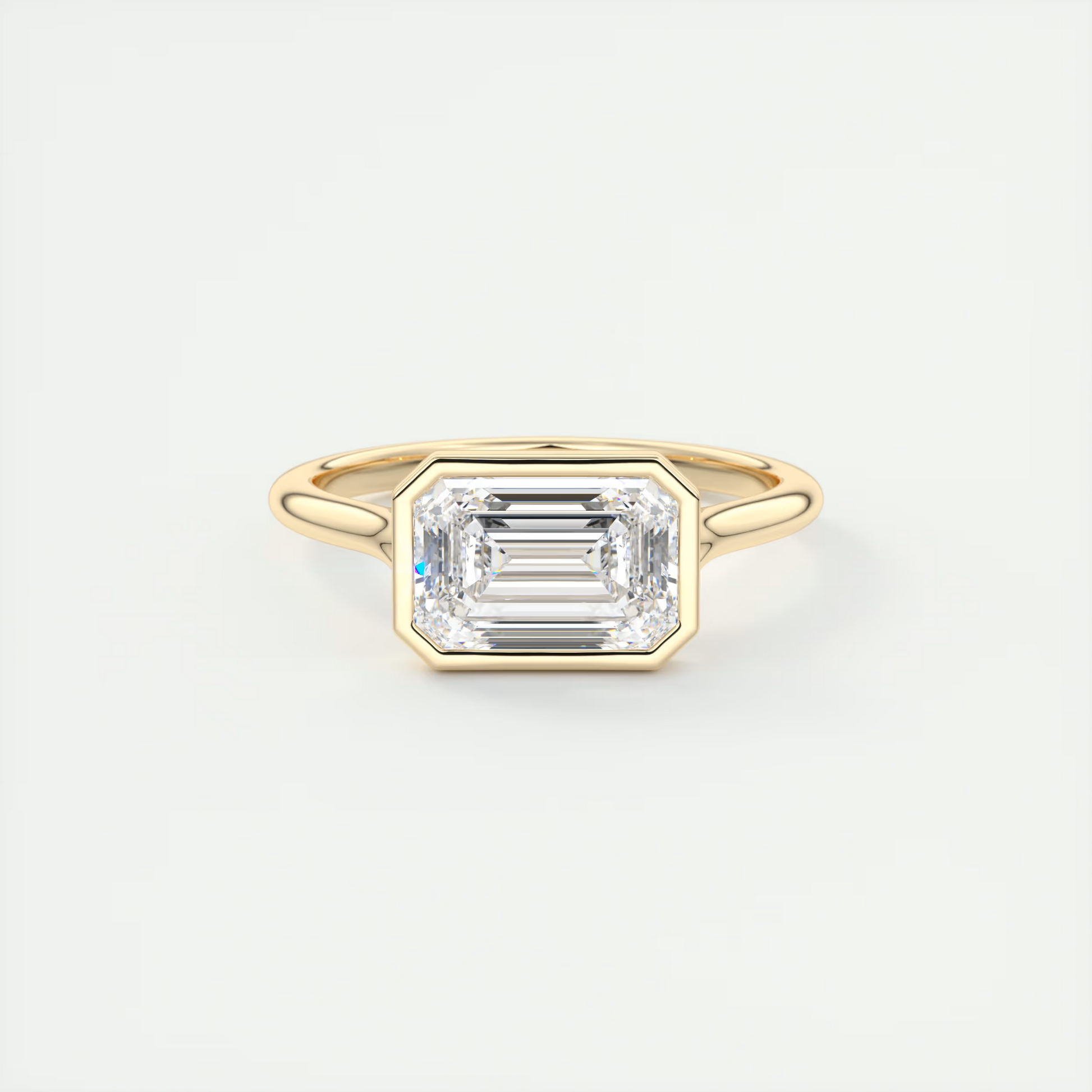 2 ct Emerald Flush Stacking East-West Bezel Solitaire