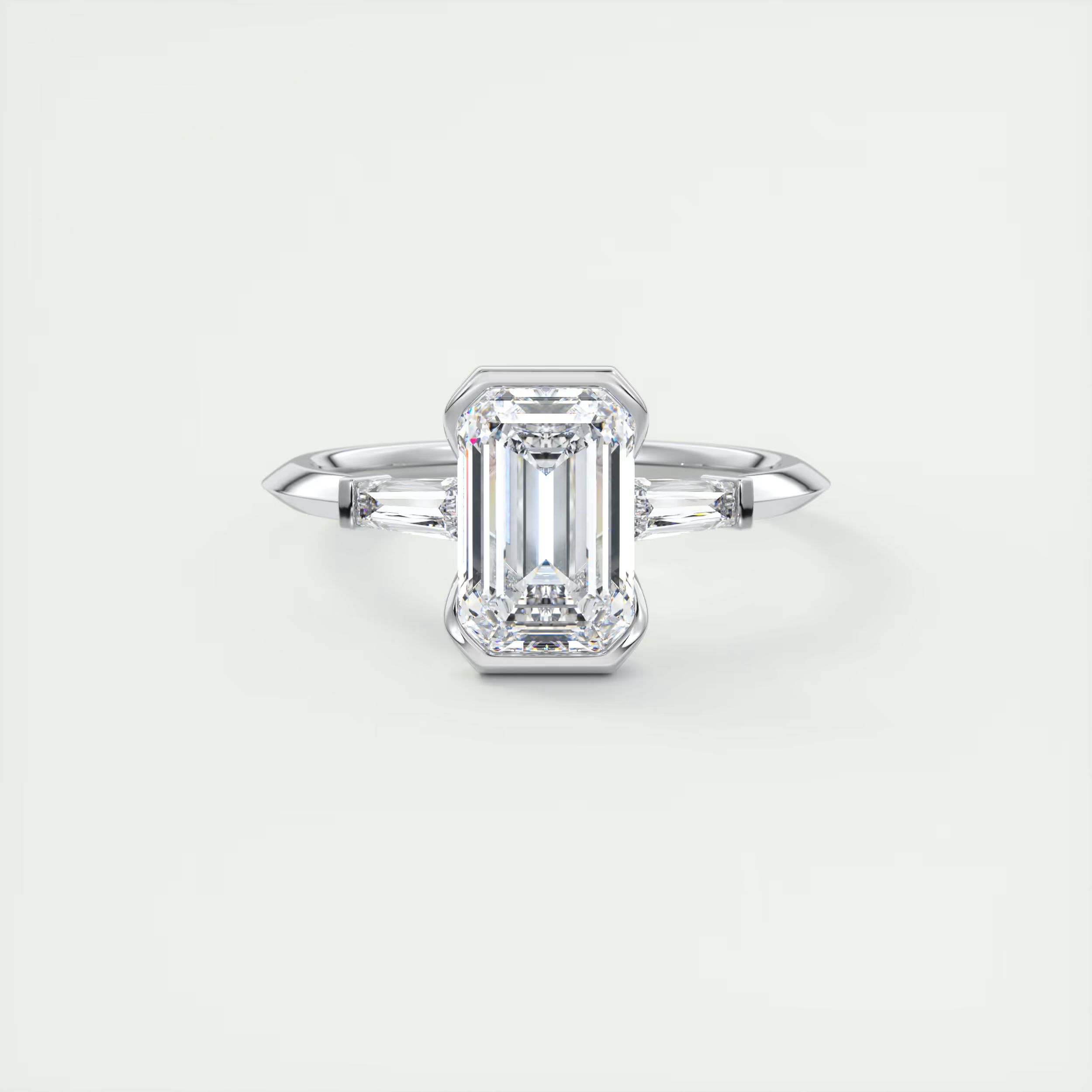 Sharp 2 Carat Emerald Half Bezel Three-Stone Engagement Ring