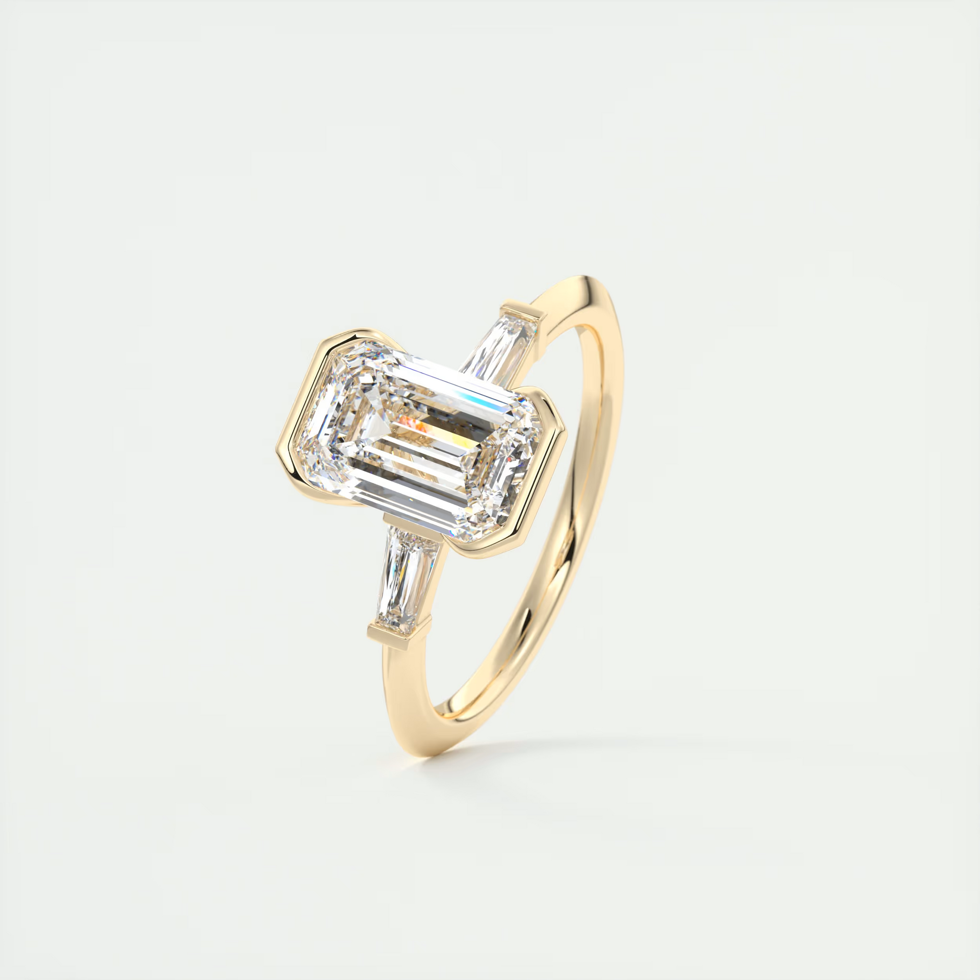 Sharp 2 Carat Emerald Half Bezel Three-Stone Engagement Ring