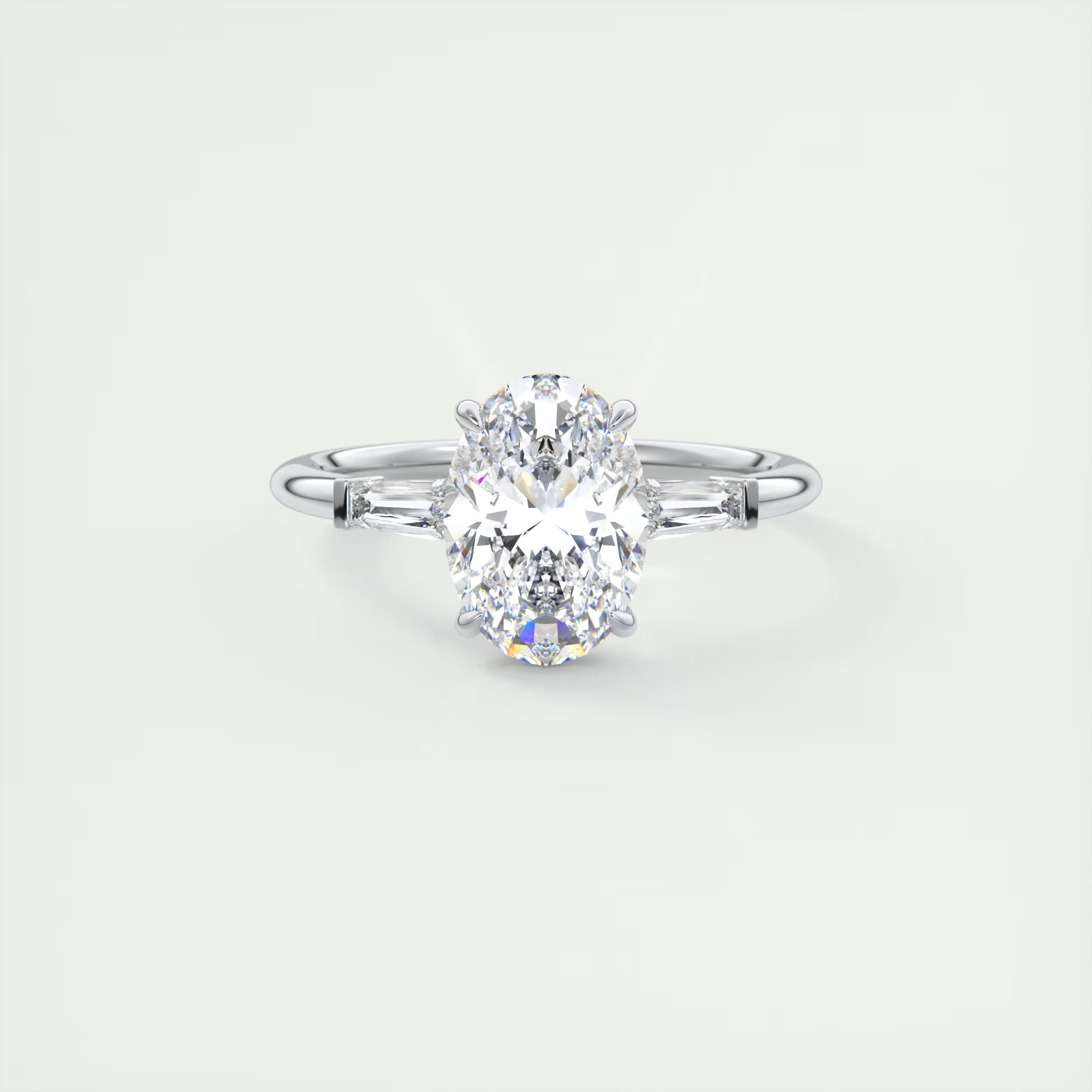 Tapered 2 Carat Oval Plunge Three-Stone Engagement Ring