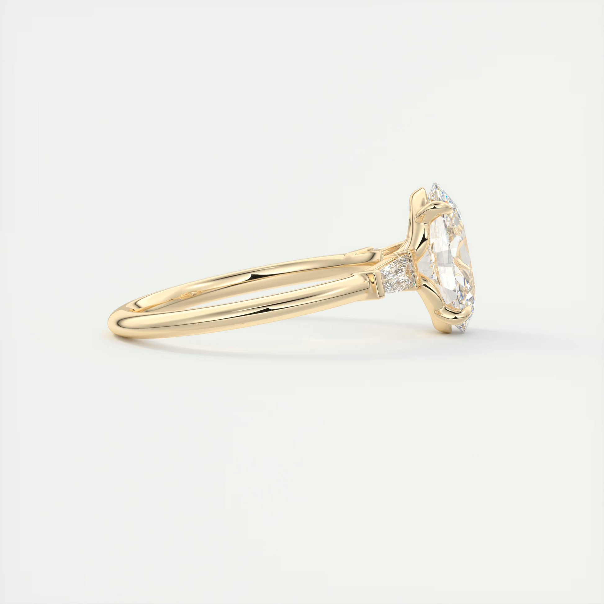 Tapered 2 Carat Oval Plunge Three-Stone Engagement Ring