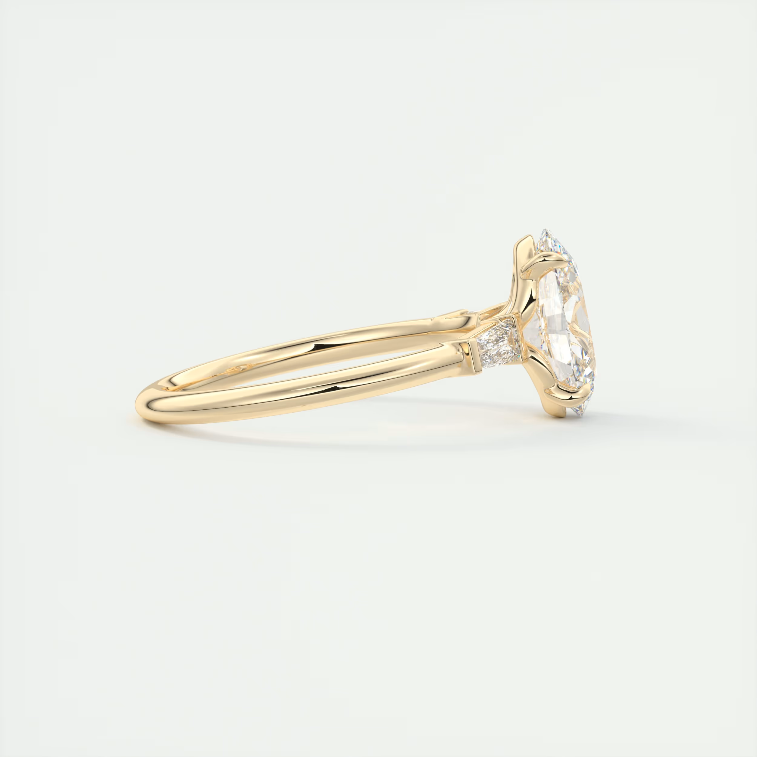 Tapered 2 Carat Oval Plunge Three-Stone Engagement Ring