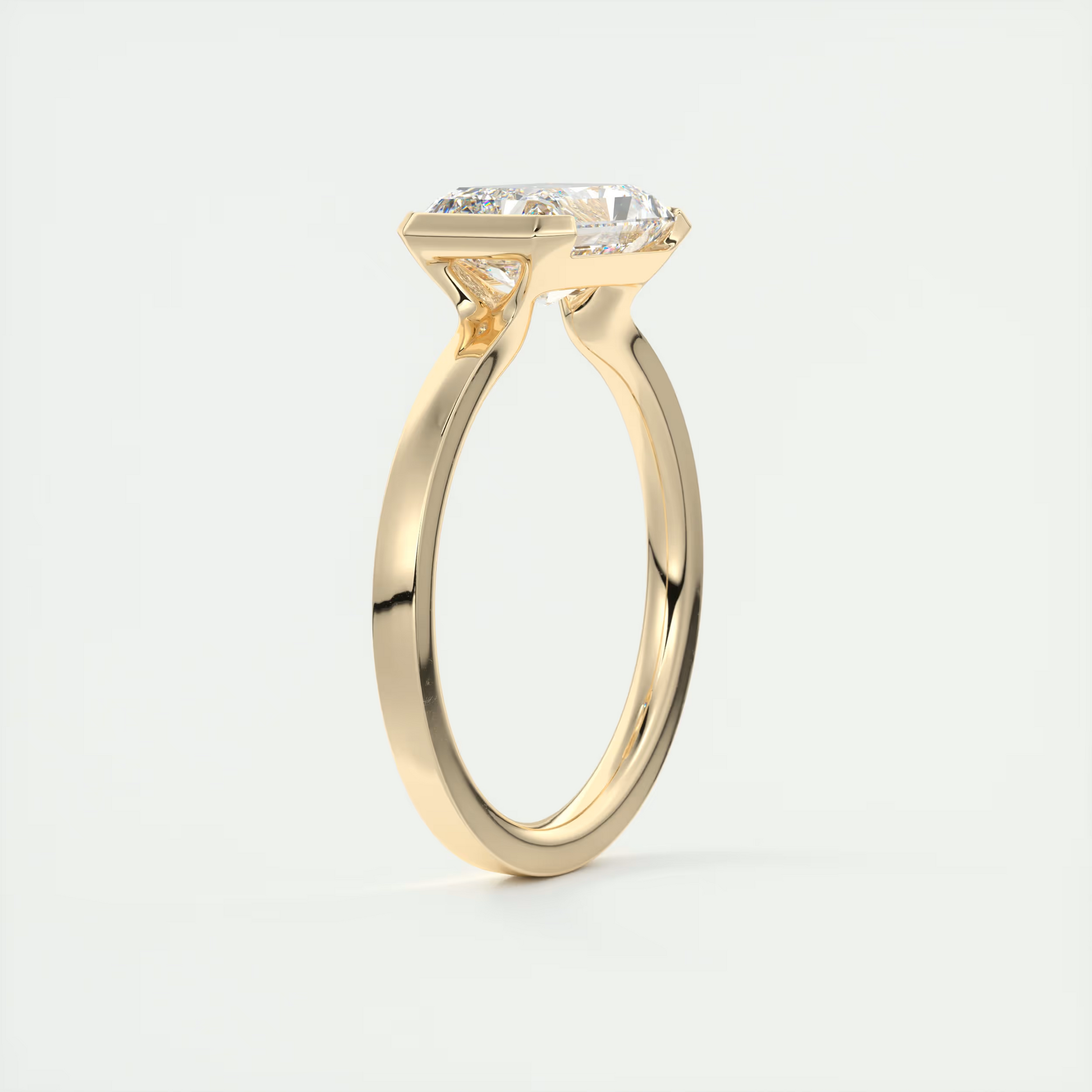 2 Carat East West Radiant Emerald Half Bezel Solitaire