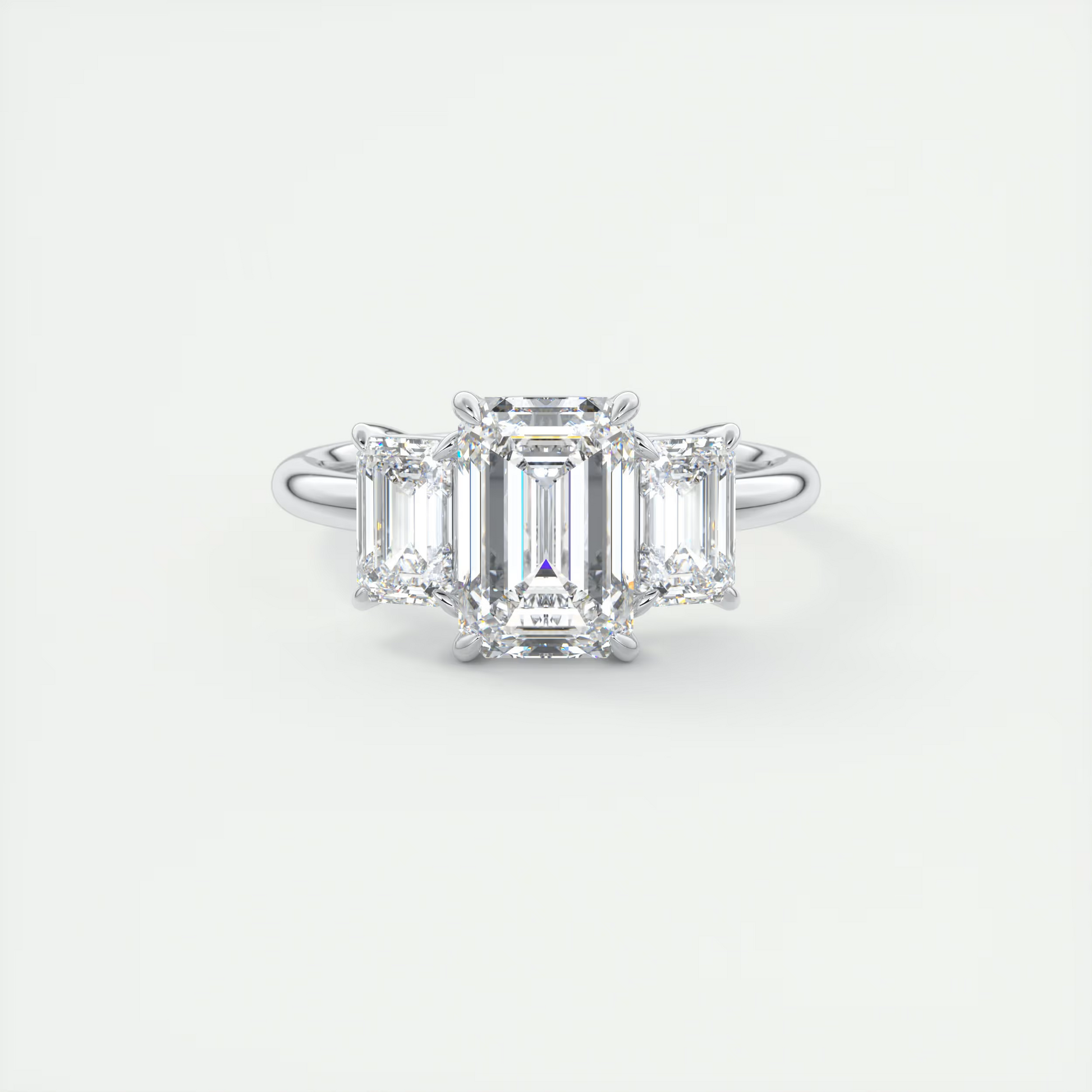 Curve 2 Carat Emerald Three-Stone Diamond Ring