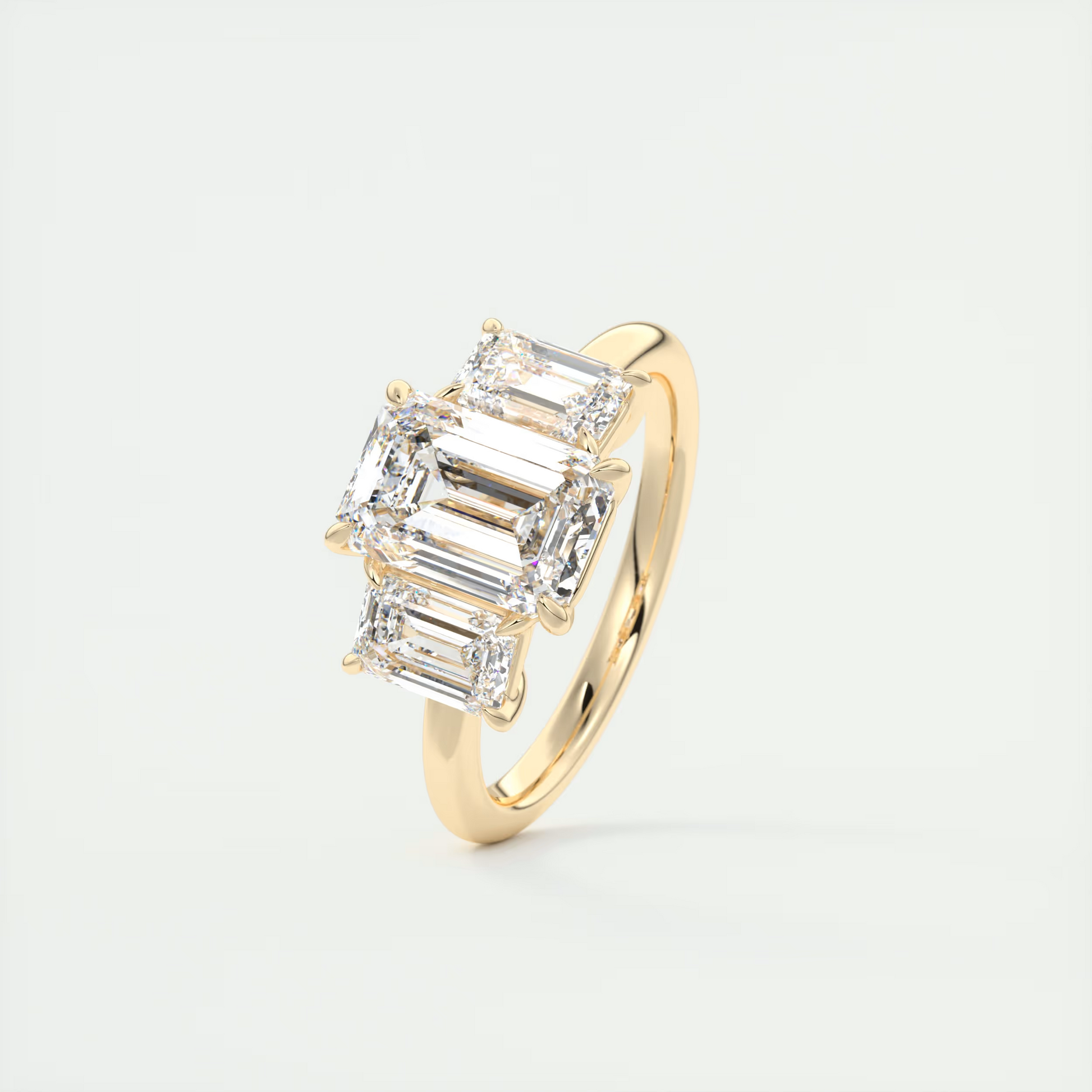 Curve 2 Carat Emerald Three-Stone Diamond Ring