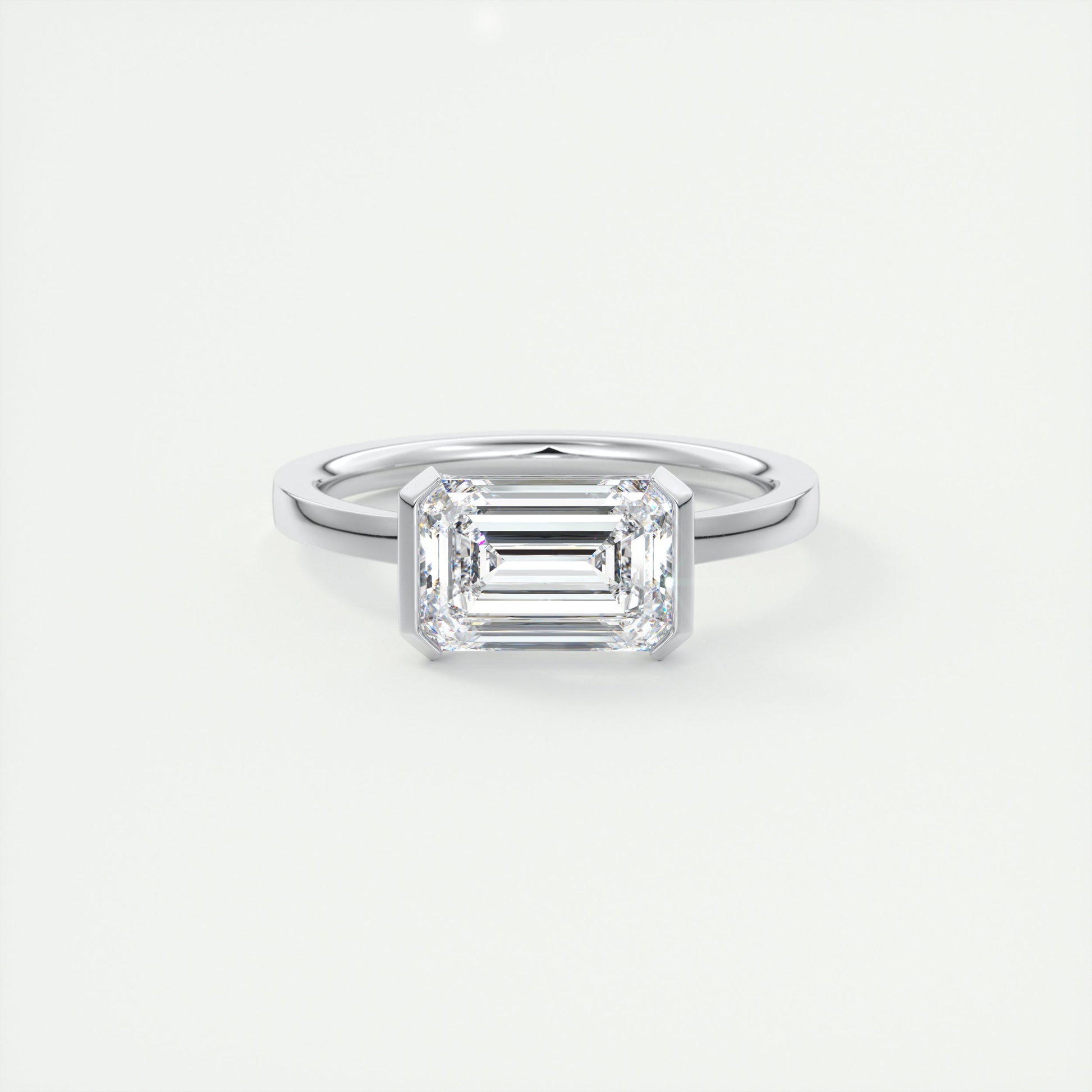 2 Carat East West Emerald Half Bezel Solitaire