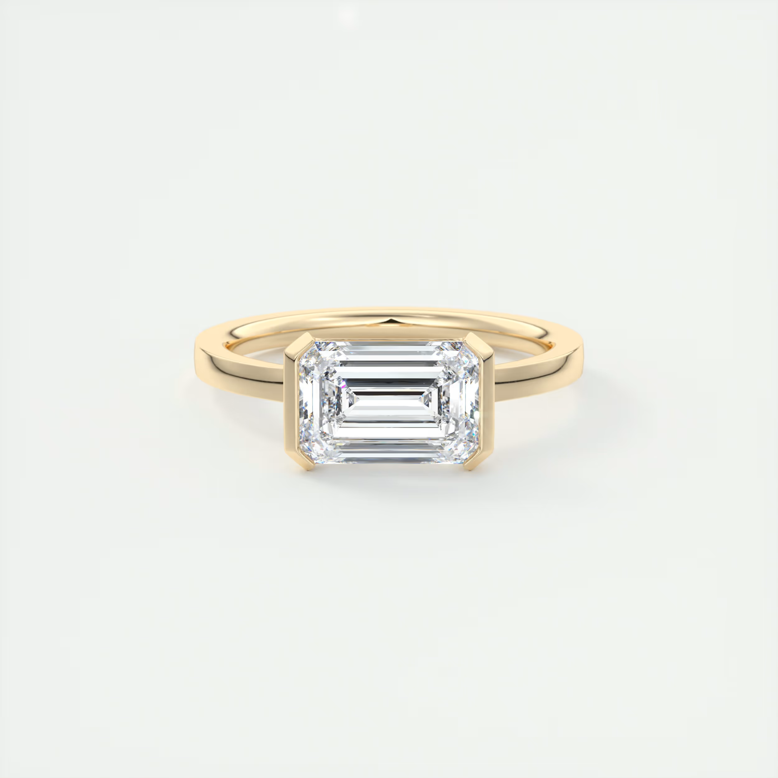 2 Carat East West Emerald Half Bezel Solitaire