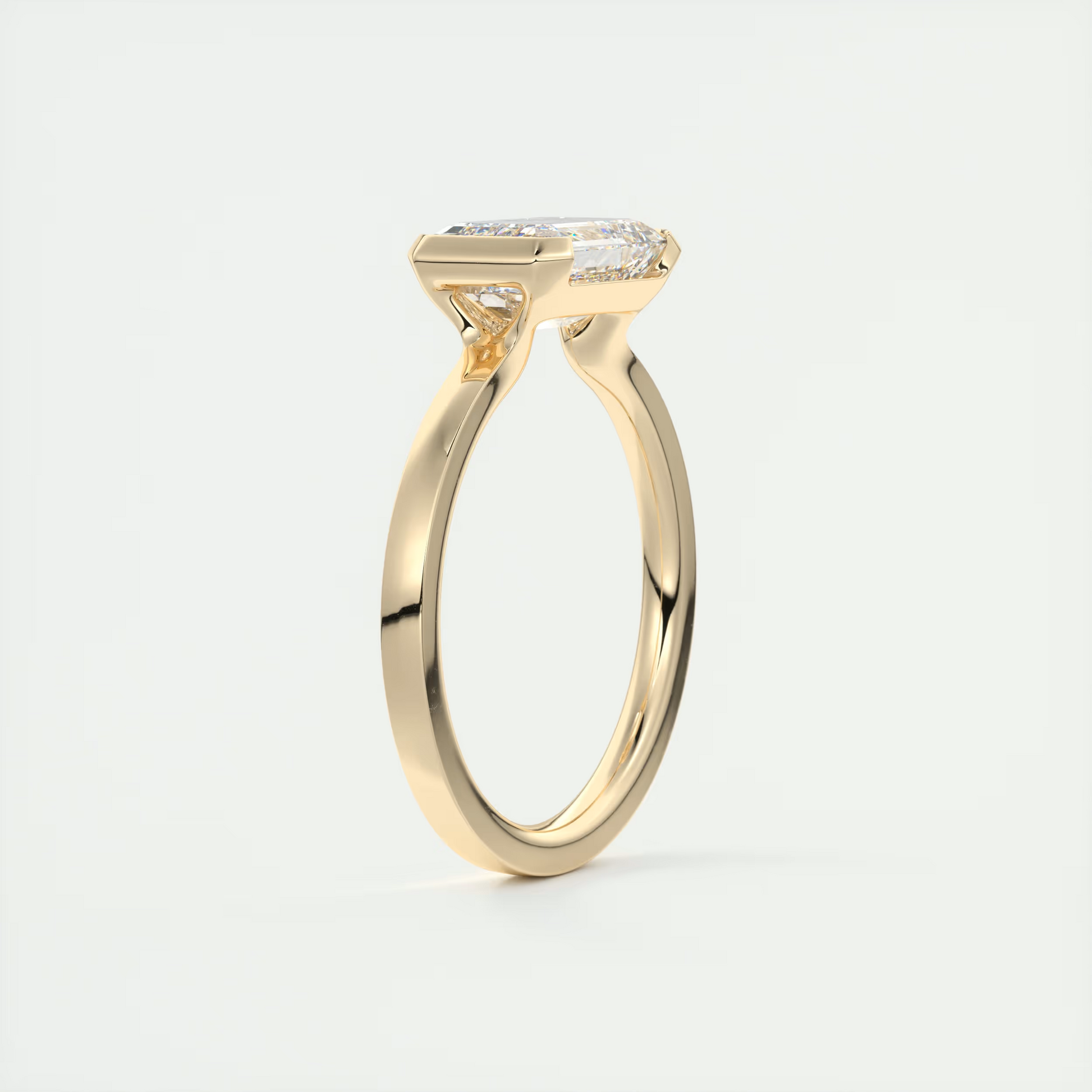 2 Carat East West Emerald Half Bezel Solitaire