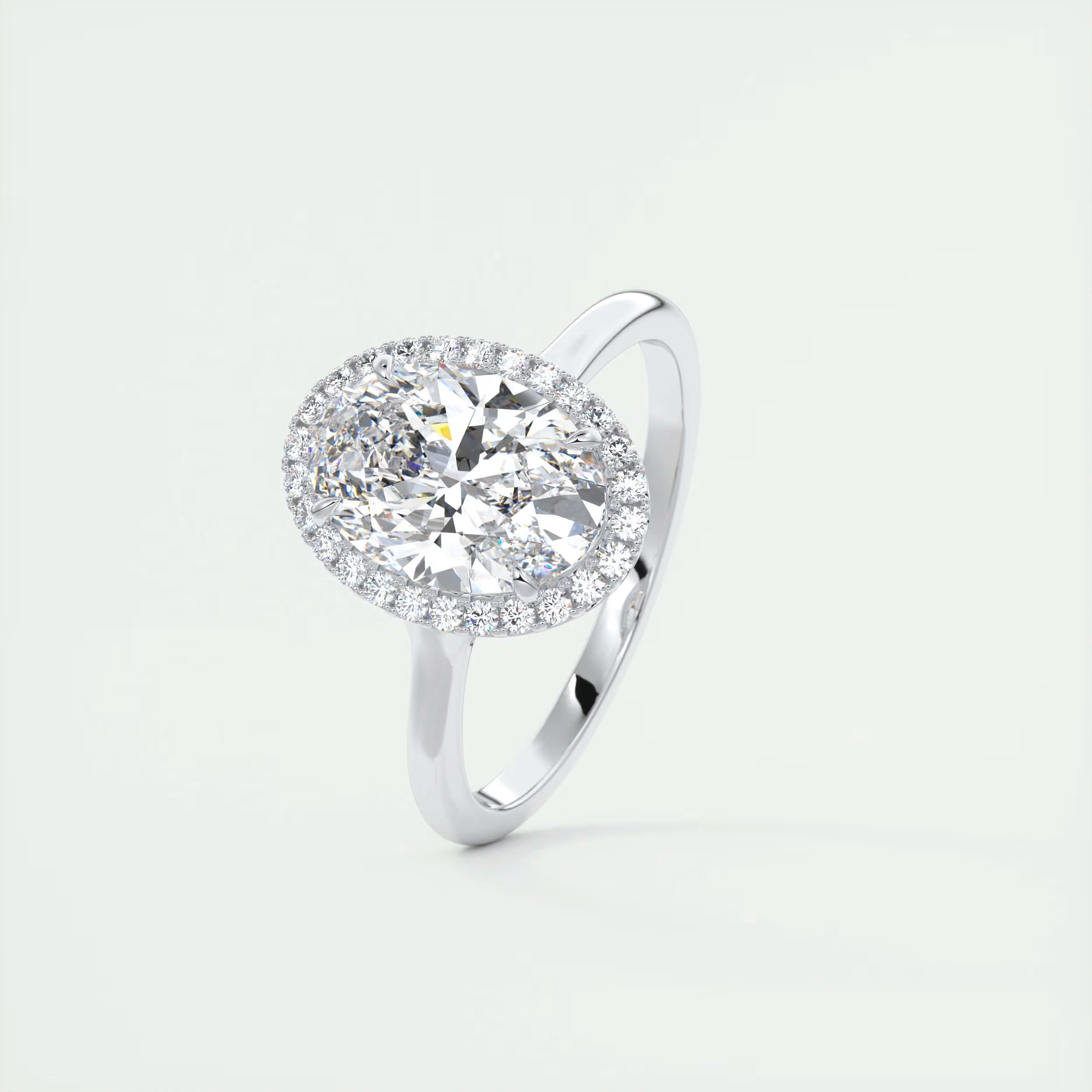 Slim 2 Carat Oval Center with French Set Halo
