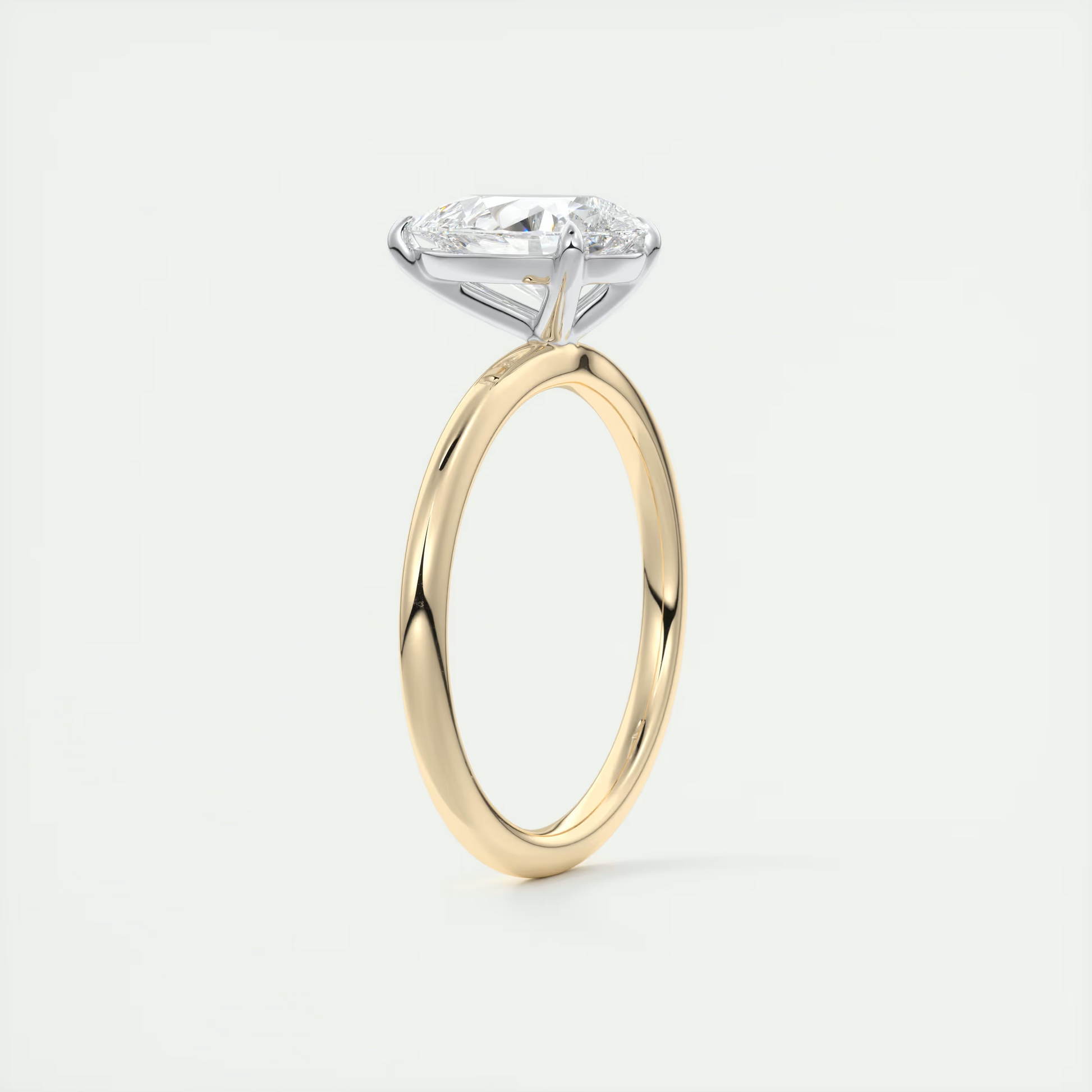 2 Carat Pear Gold Solitaire with Platinum Prongs