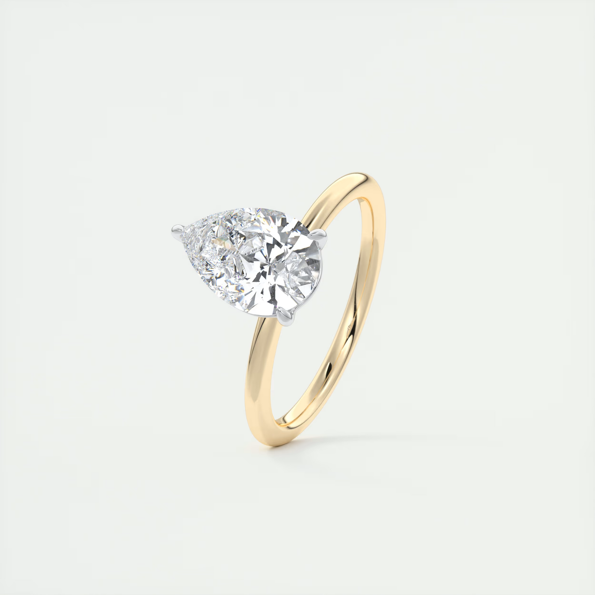 2 Carat Pear Gold Solitaire with Platinum Prongs