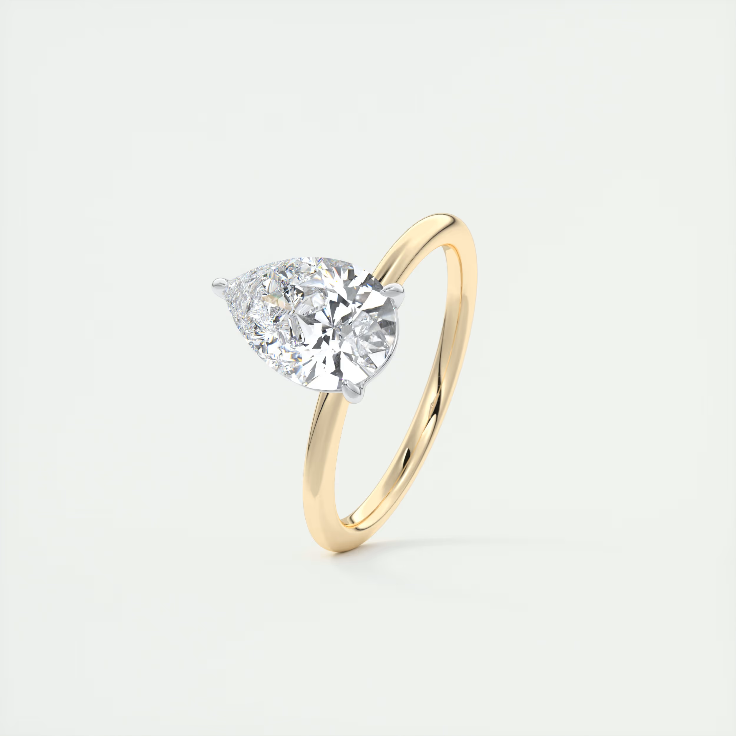 2 Carat Pear Gold Solitaire with Platinum Prongs