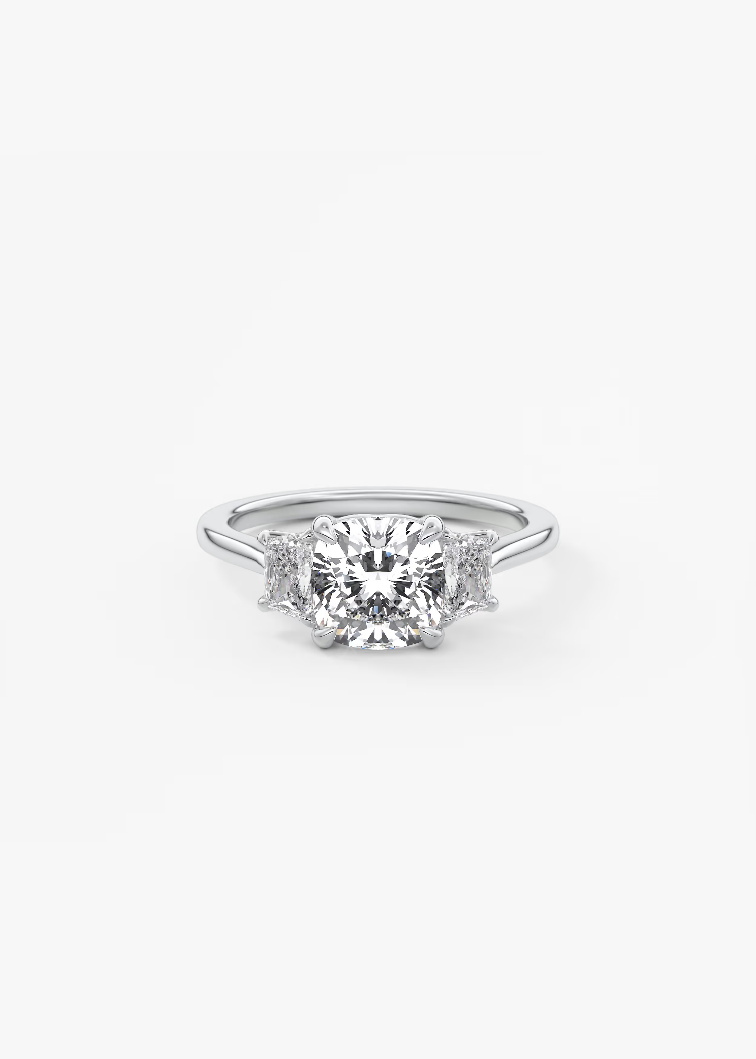 Harmonious 2 Carat Cushion Brilliant Trapezoid Three-Stone Engagement Ring