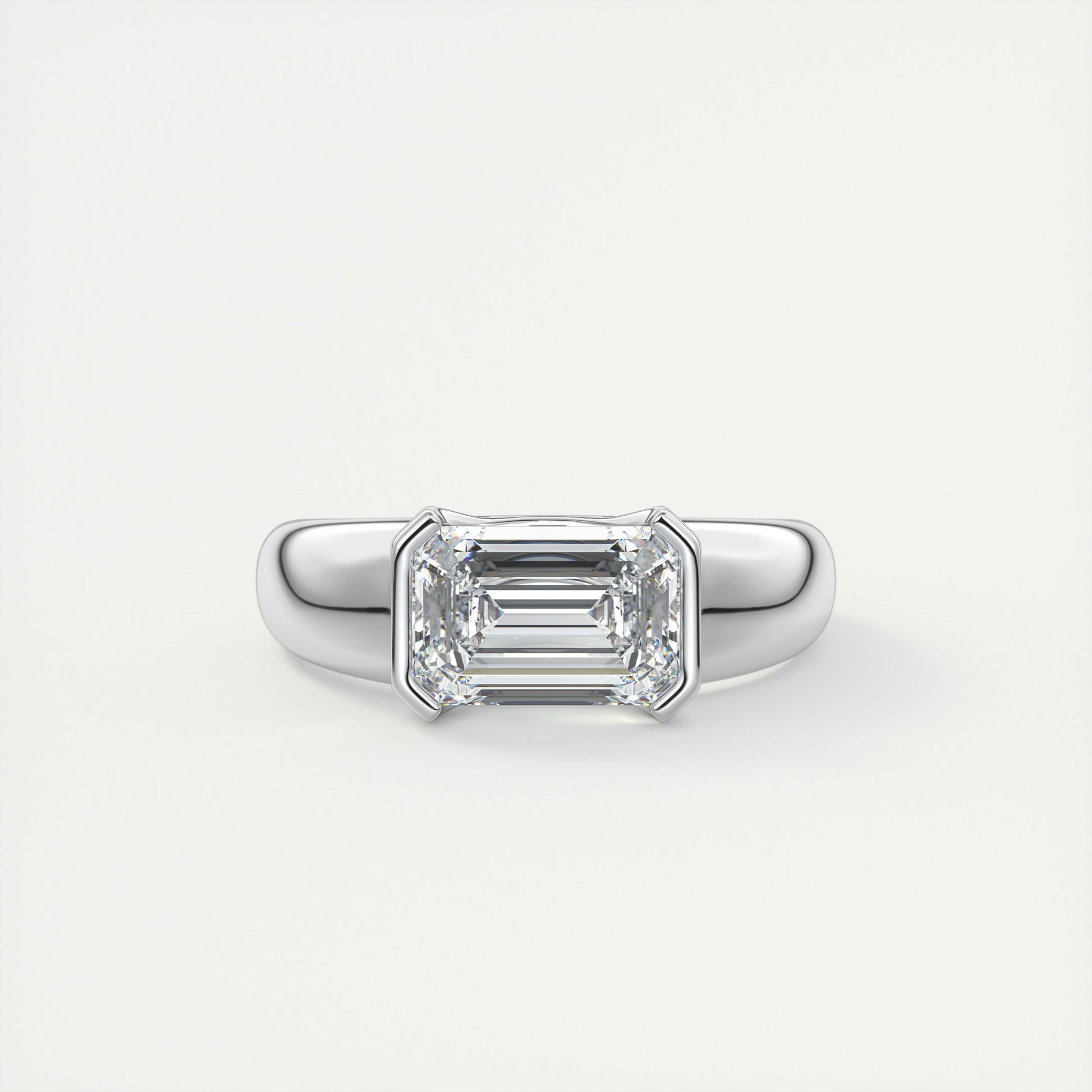 2 Carat Chunky Half Bezel Emerald Solitaire