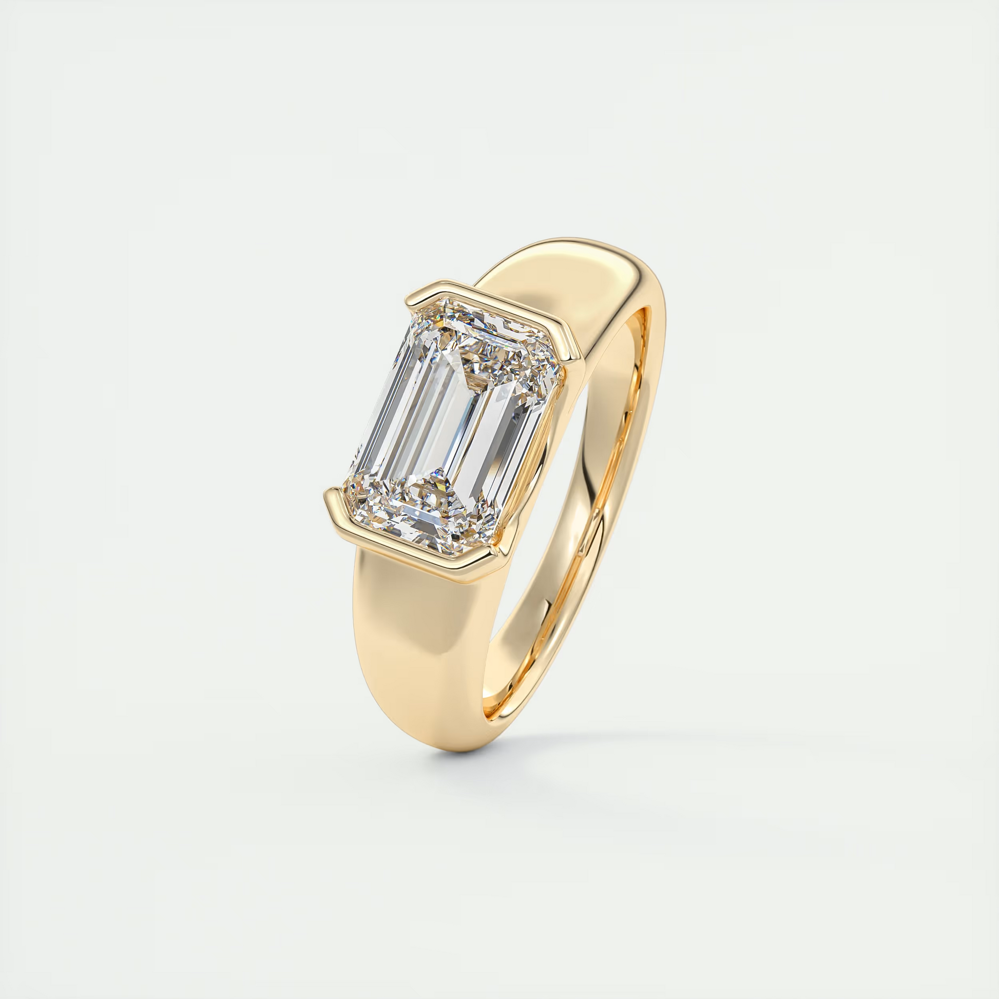 2 Carat Chunky Half Bezel Emerald Solitaire