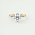 2 Carat Round Gold Solitaire with Platinum Prongs