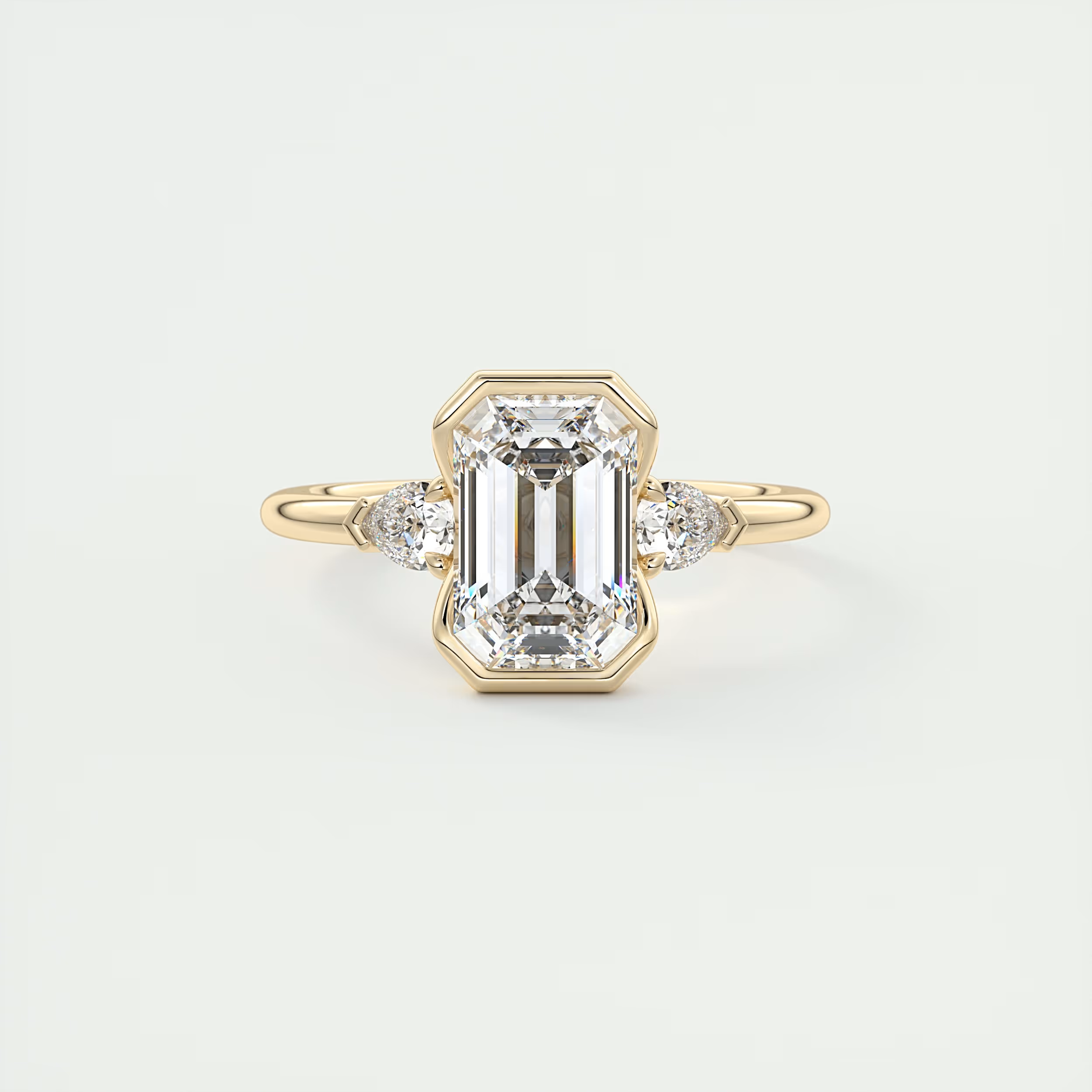 2 Carat Emerald & Pear Clutch Three-Stone Engagement Ring