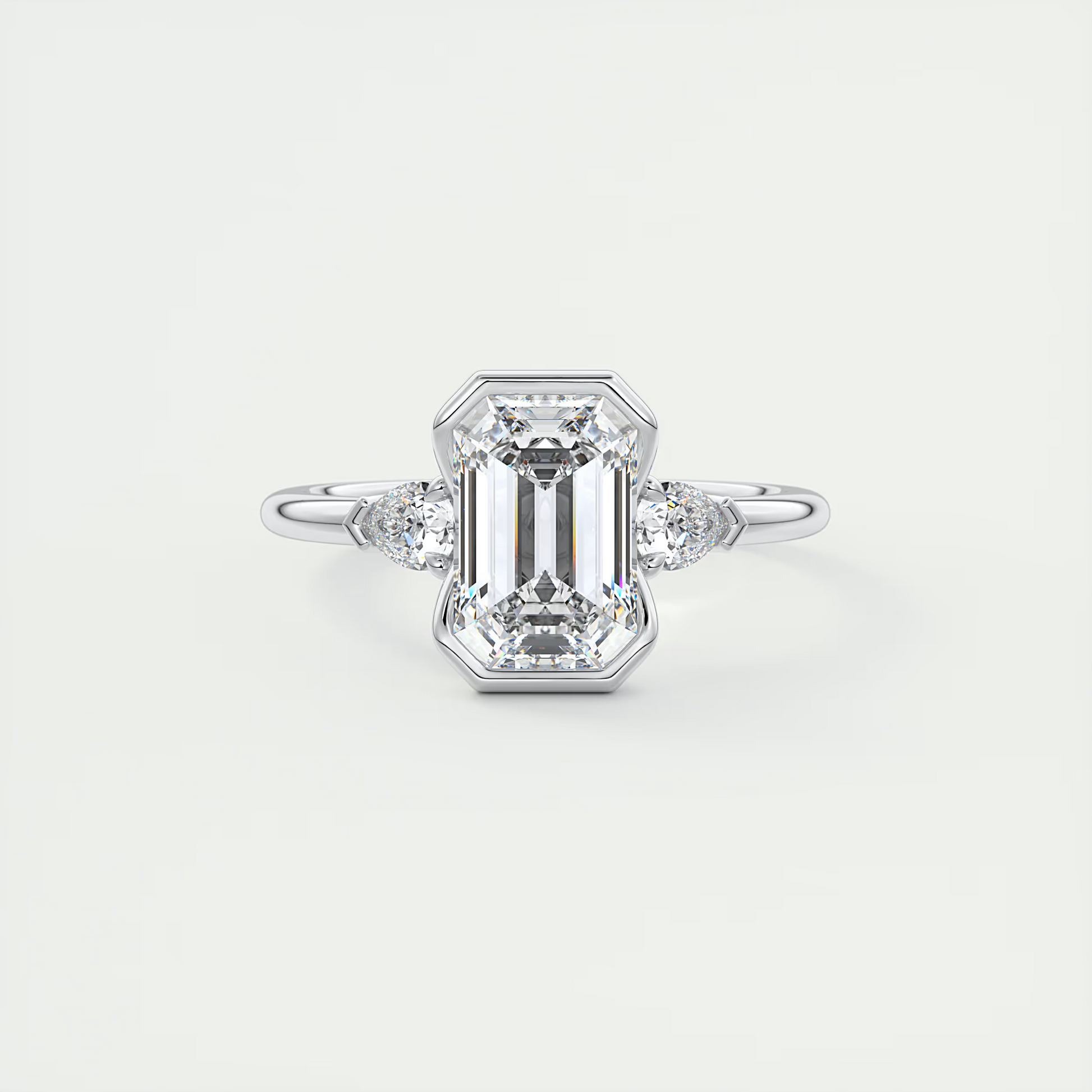 2 Carat Emerald & Pear Clutch Three-Stone Engagement Ring