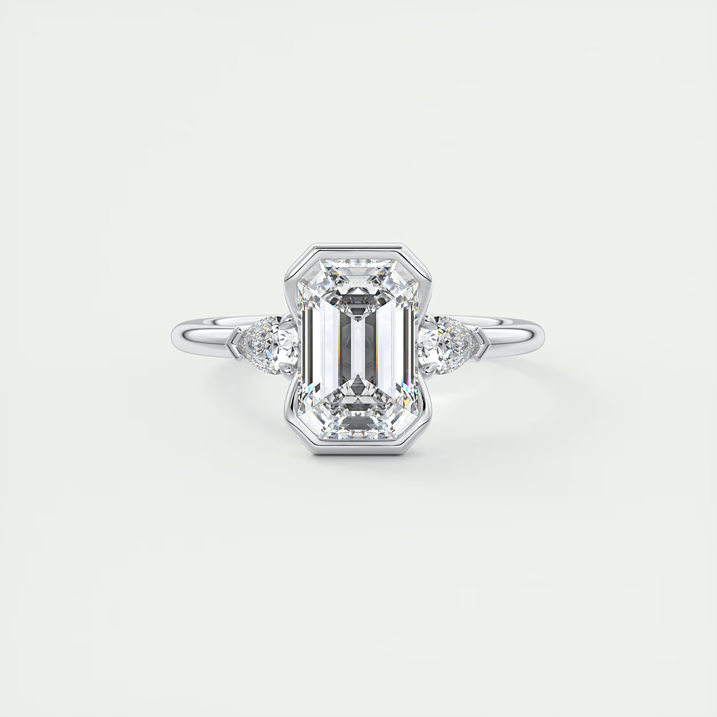 2 Carat Emerald & Pear Clutch Three-Stone Engagement Ring