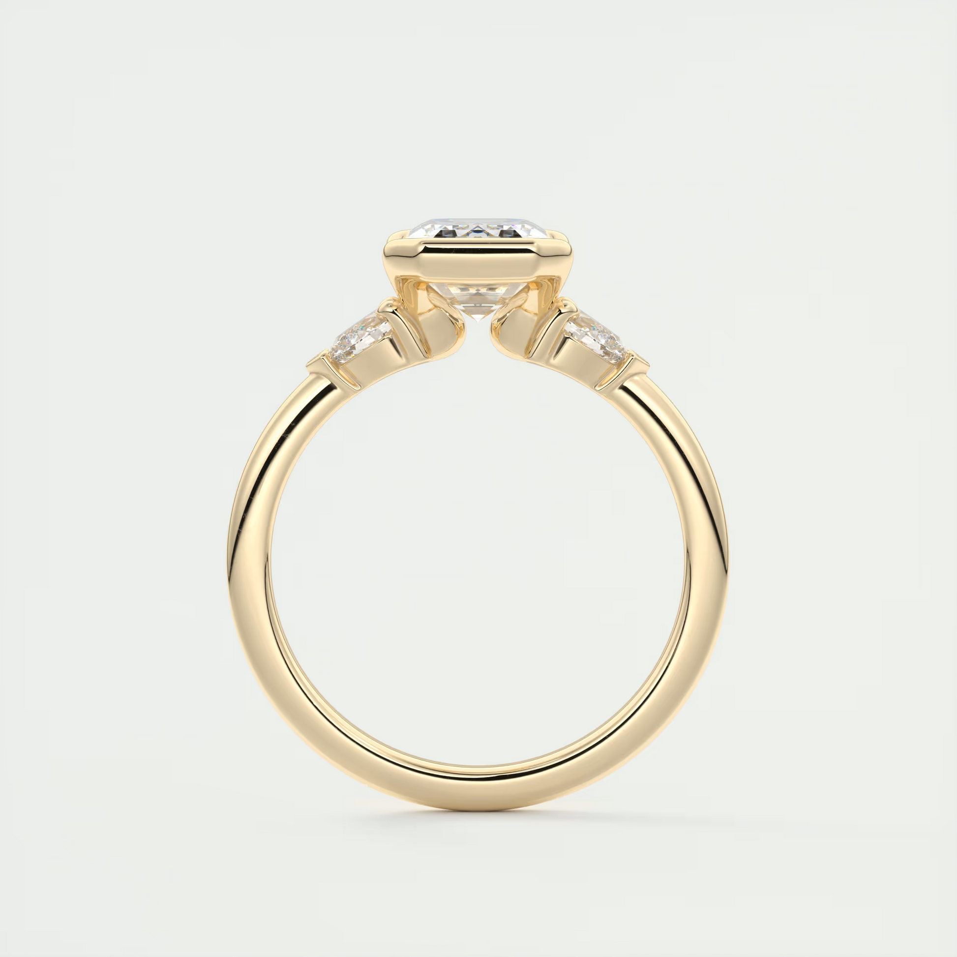 2 Carat Emerald & Pear Clutch Three-Stone Engagement Ring