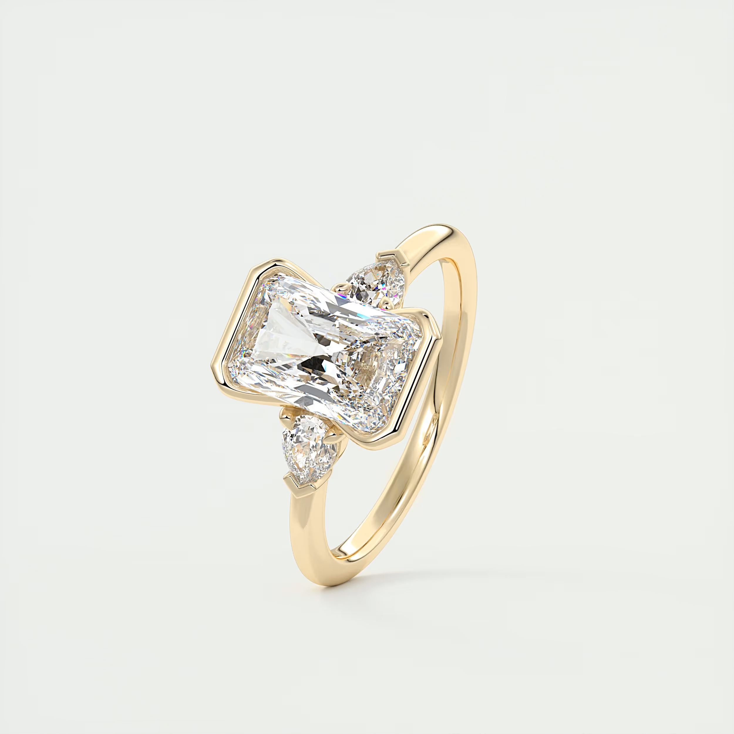 Elegantly 2 Carat Radiant & Pear Clutch Three-Stone Engagement Ring