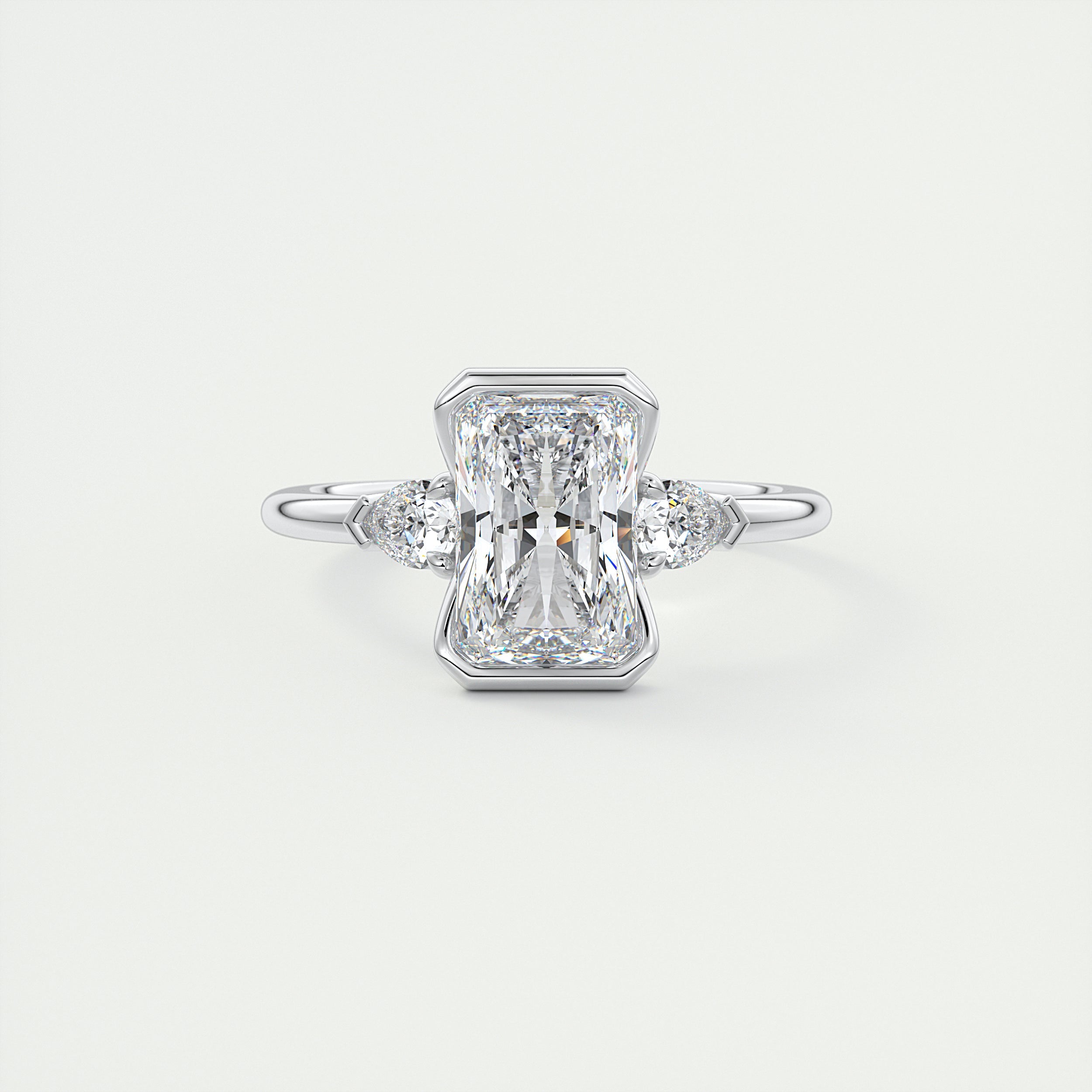 Elegantly 2 Carat Radiant & Pear Clutch Three-Stone Engagement Ring