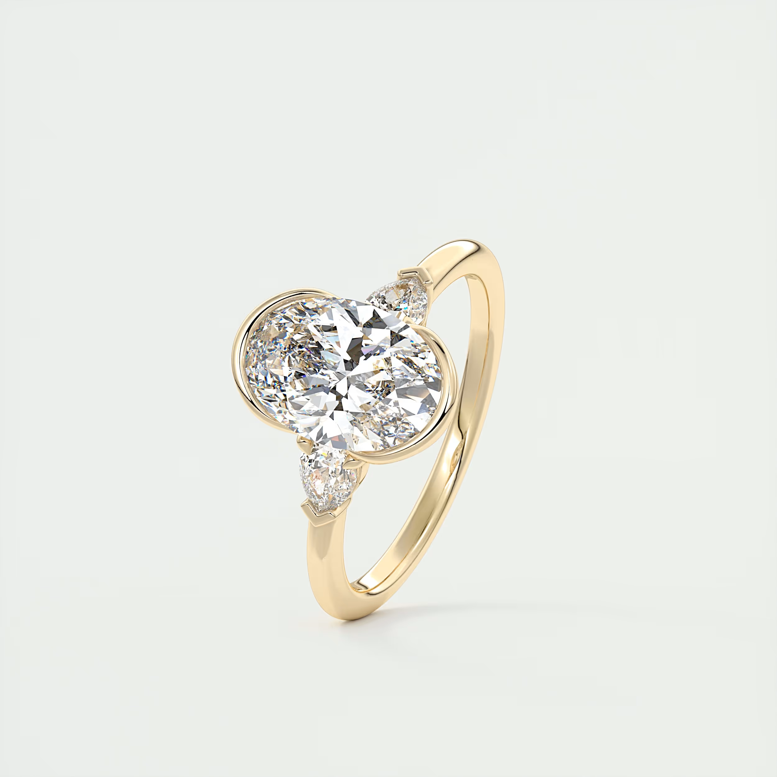 2 Carat Pear & Oval Clutch Three-Stone Engagement Ring