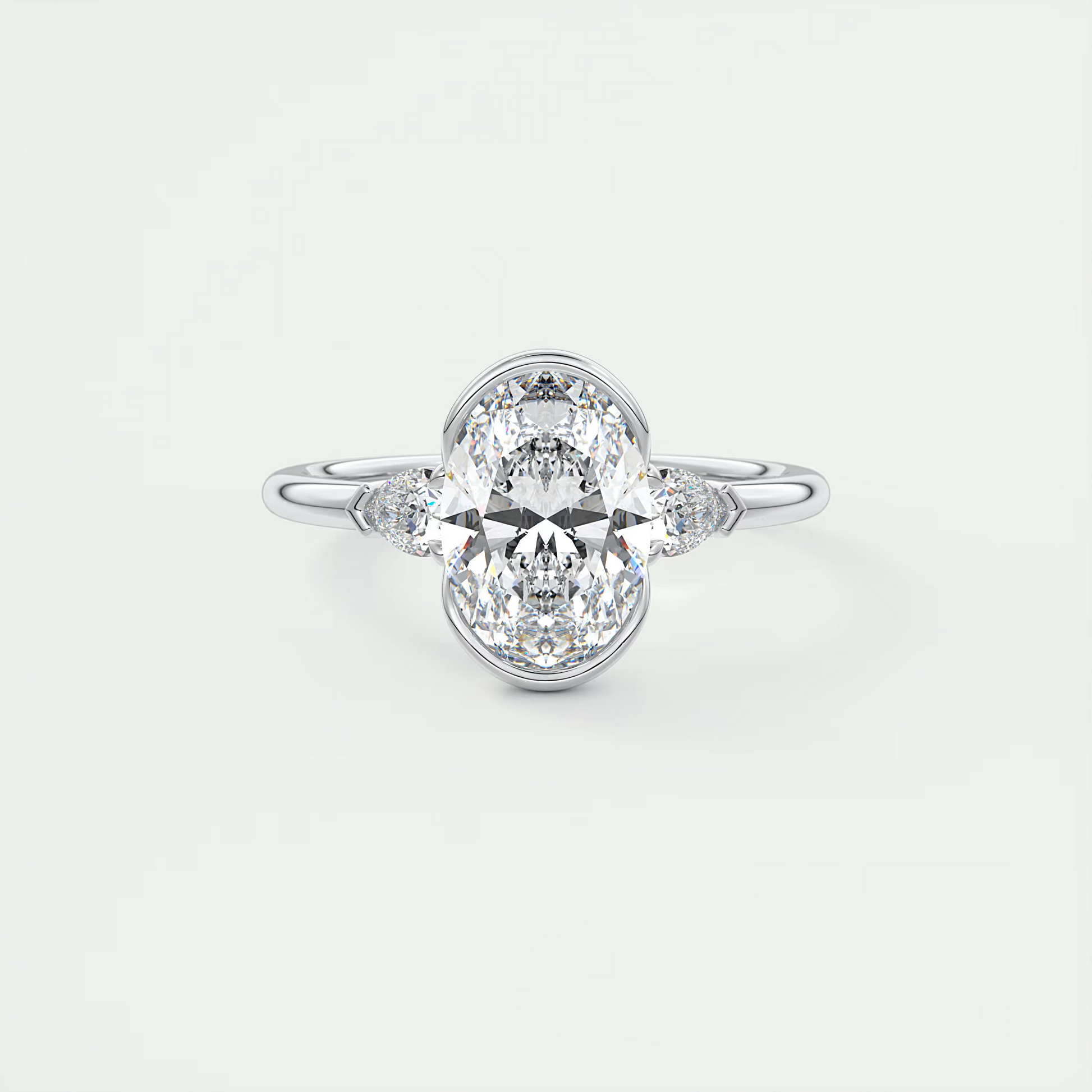 2 Carat Pear & Oval Clutch Three-Stone Engagement Ring