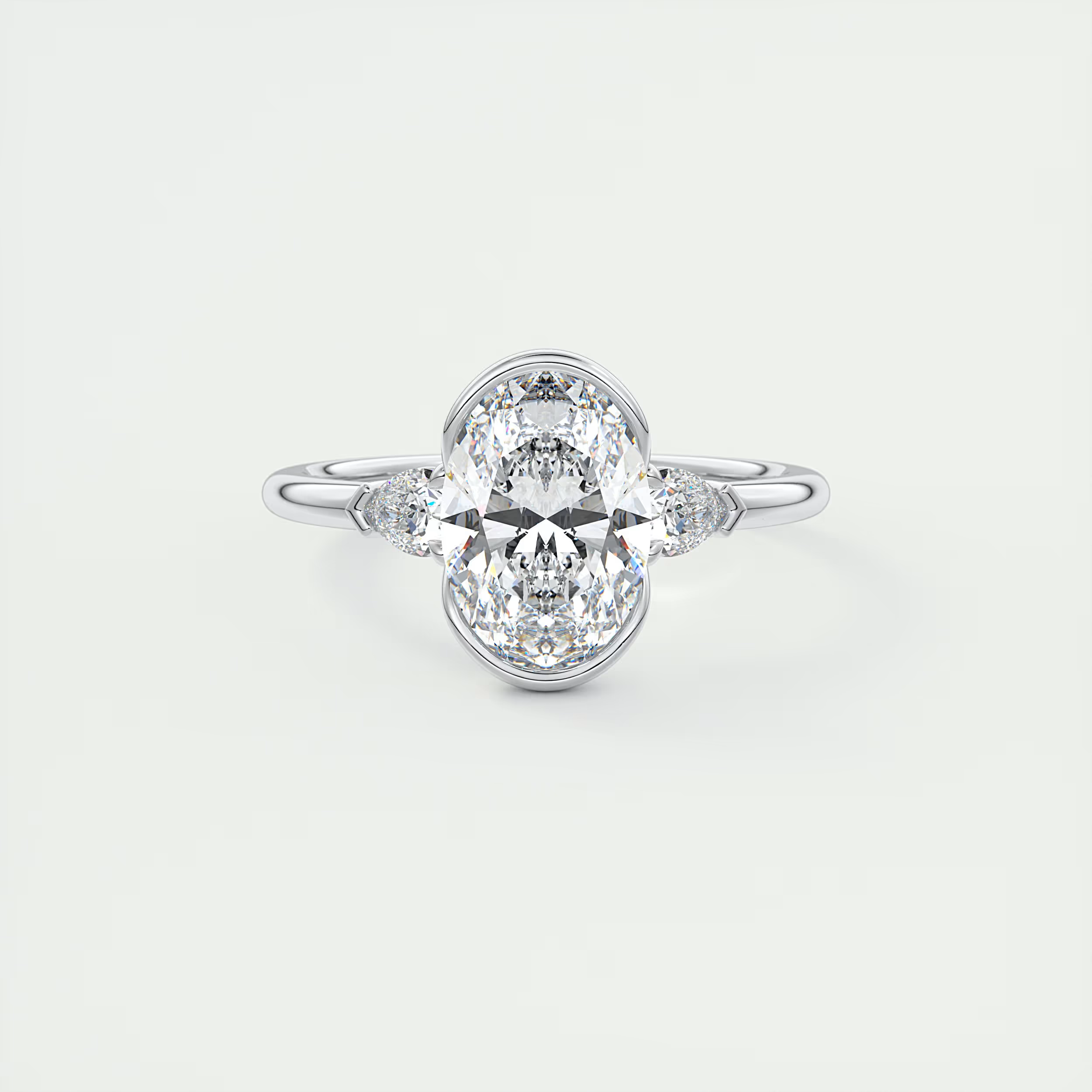 2 Carat Pear & Oval Clutch Three-Stone Engagement Ring