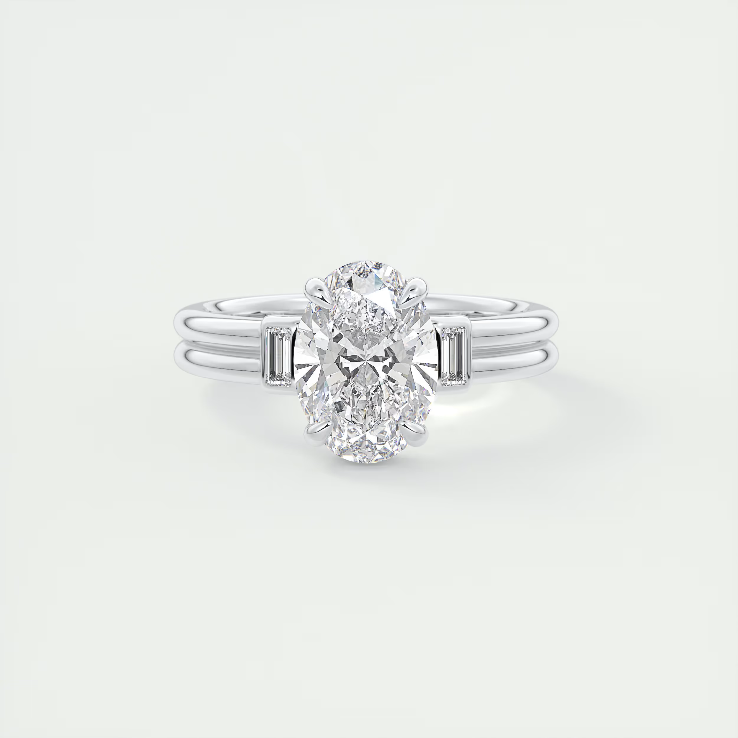 Modern 2 Carat Oval & Baguettes Three-Stone Engagement Ring
