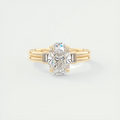 Modern 2 Carat Oval & Baguettes Three-Stone Engagement Ring