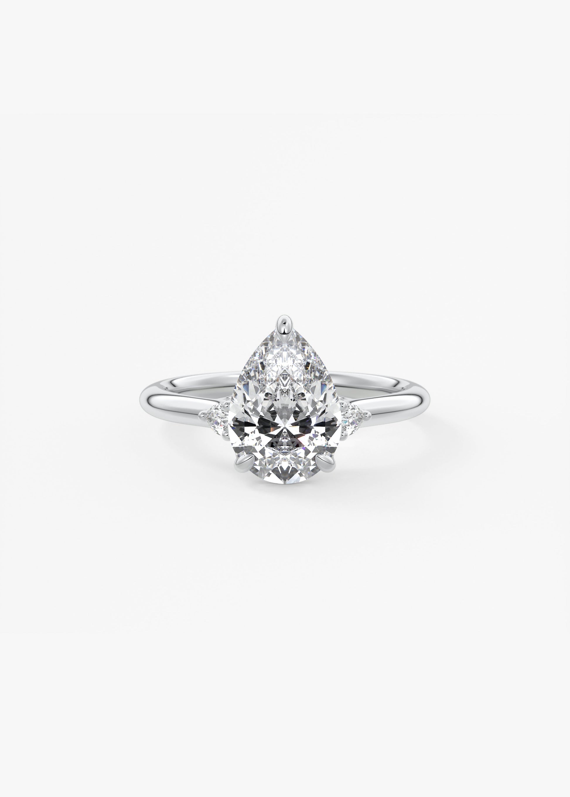 Graceful 2 Carat Pear Three-Stone Trellis Engagement Ring