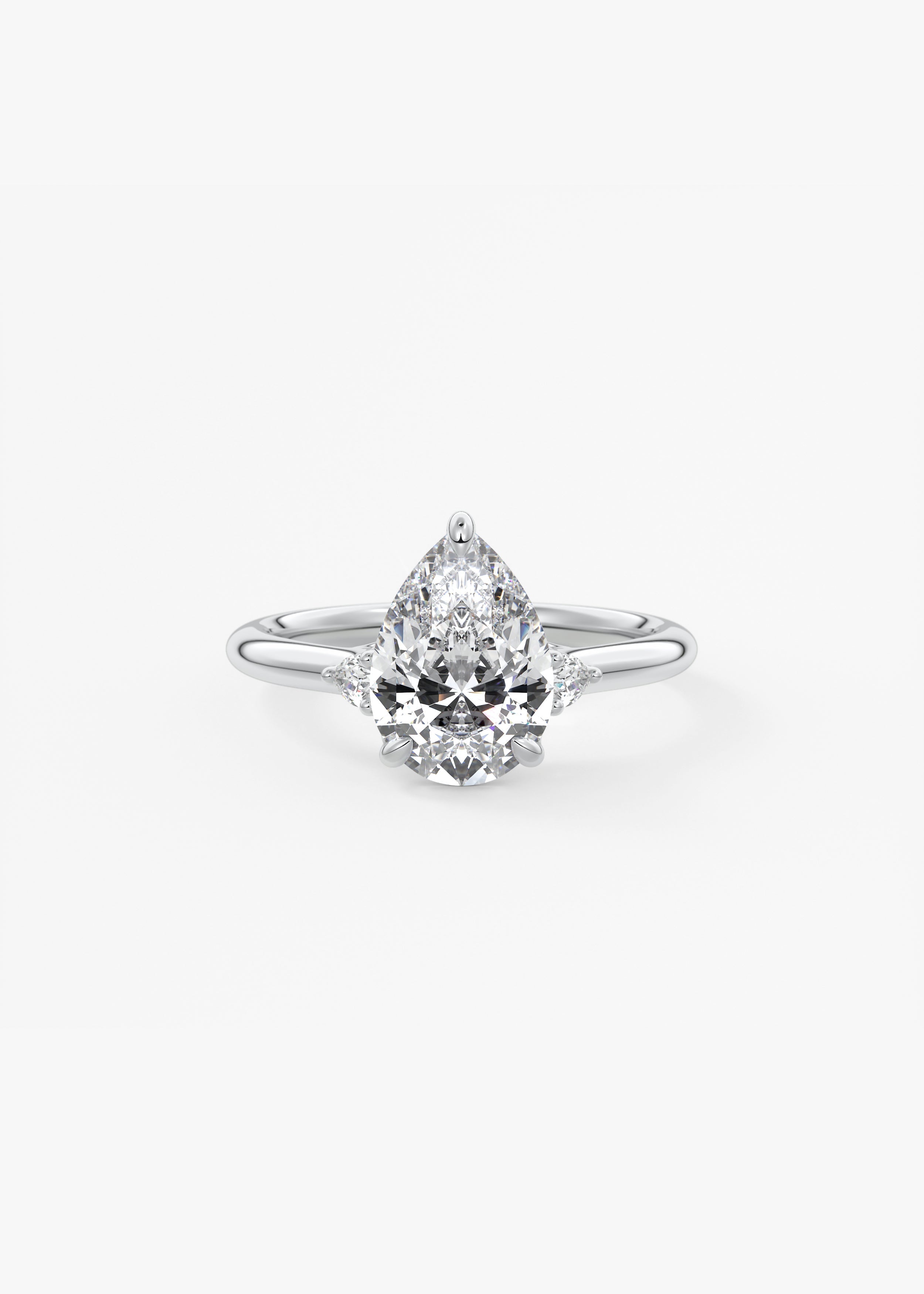Graceful 2 Carat Pear Three-Stone Trellis Engagement Ring