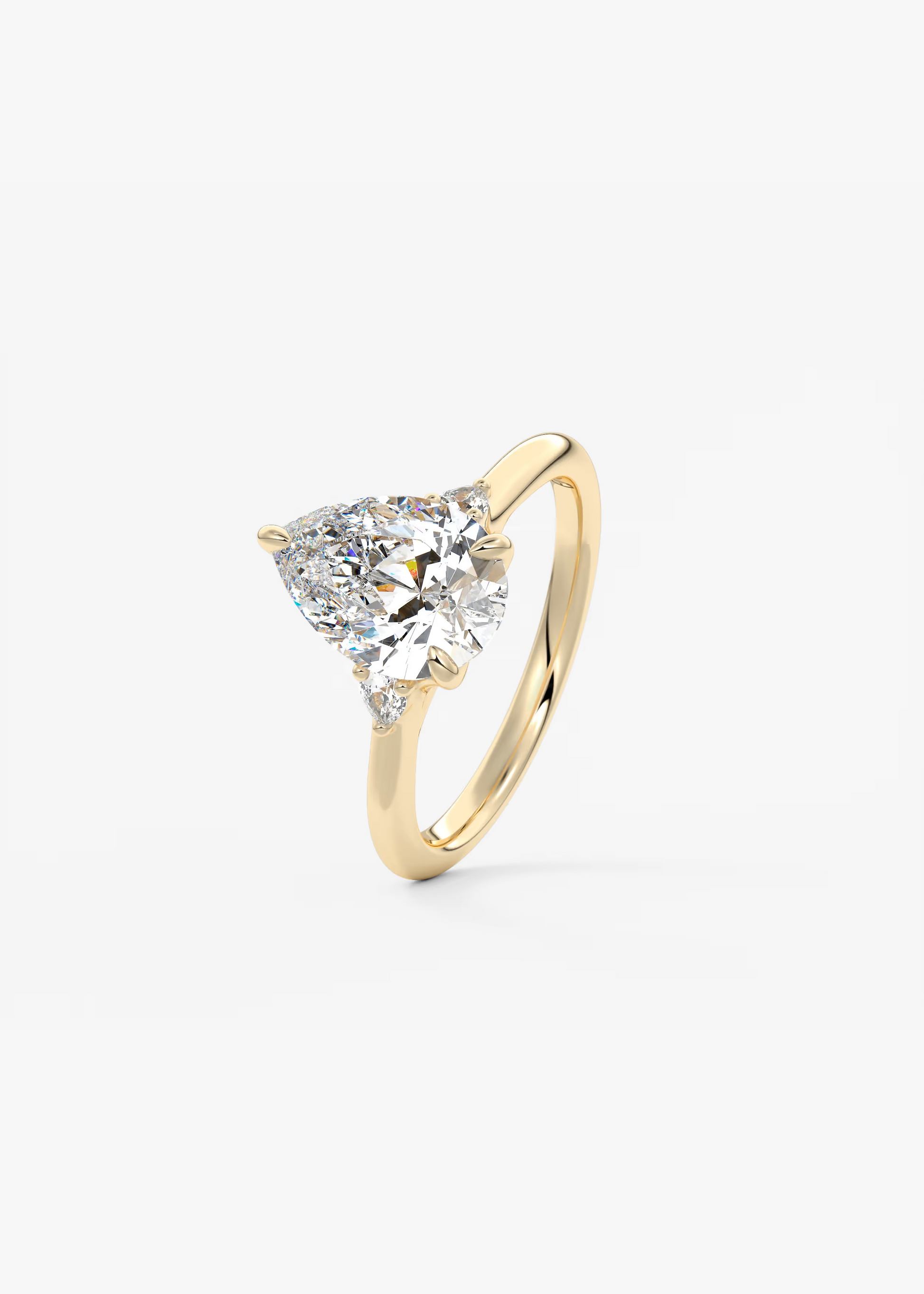 Graceful 2 Carat Pear Three-Stone Trellis Engagement Ring