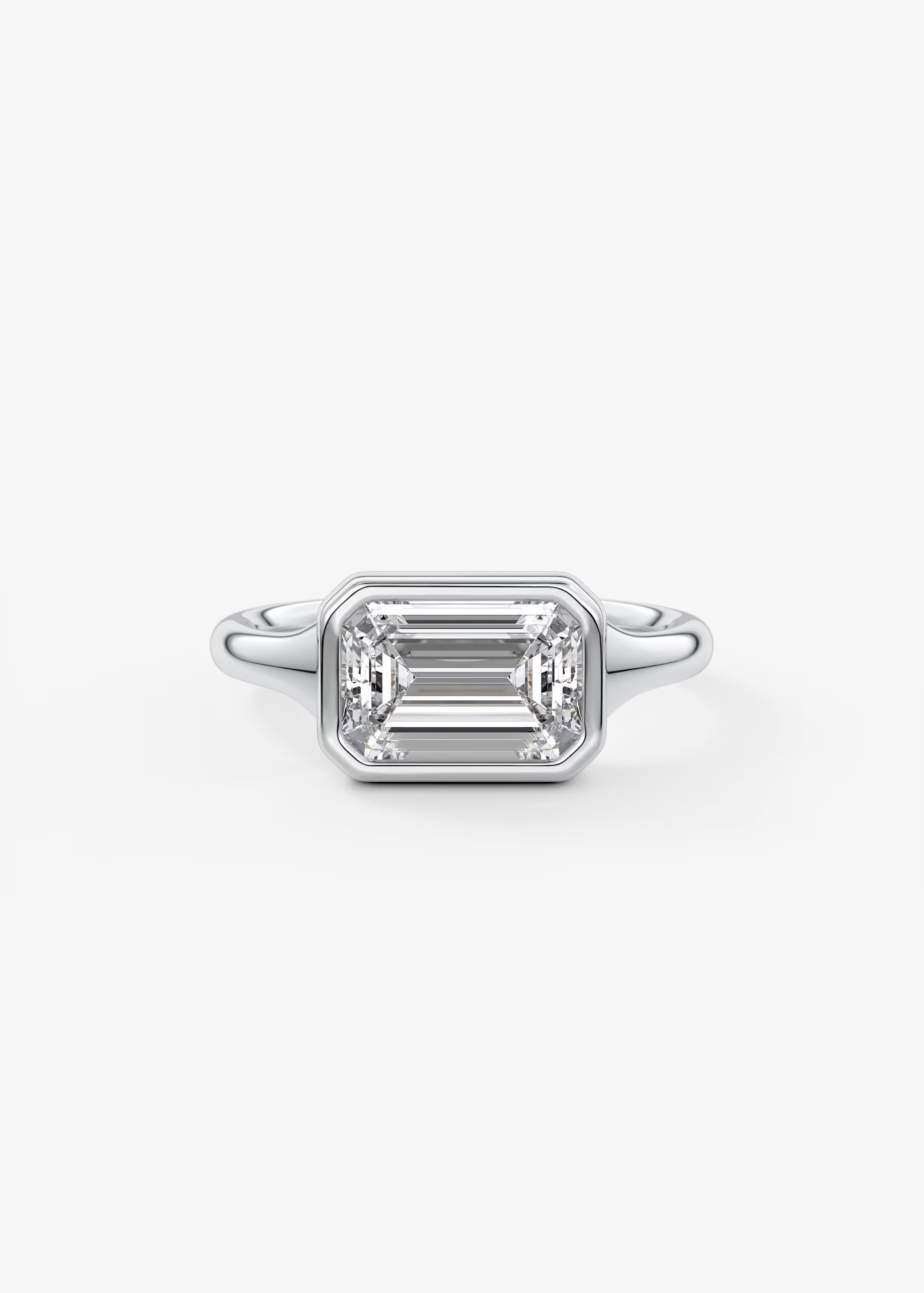 East-West 2 Carat Emerald Bezel Solitaire Ring