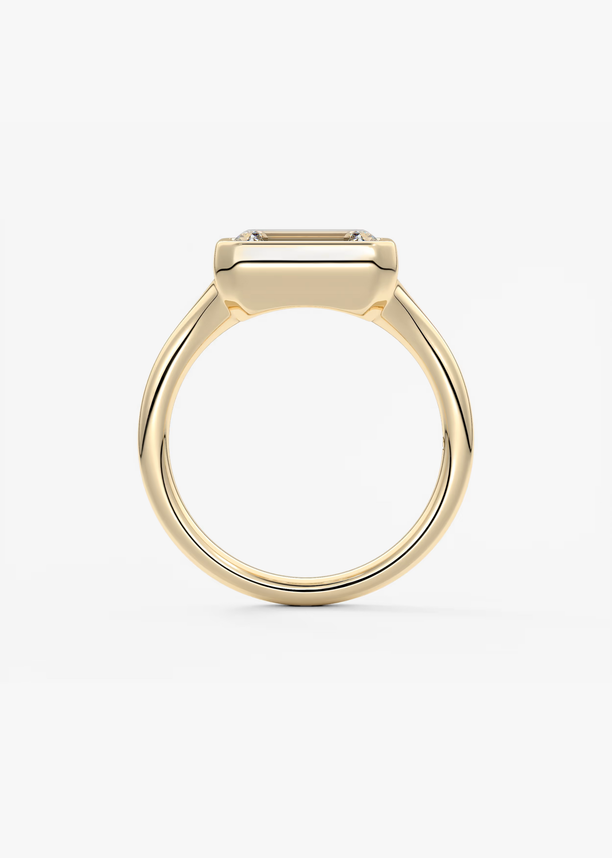 East-West 2 Carat Emerald Bezel Solitaire Ring