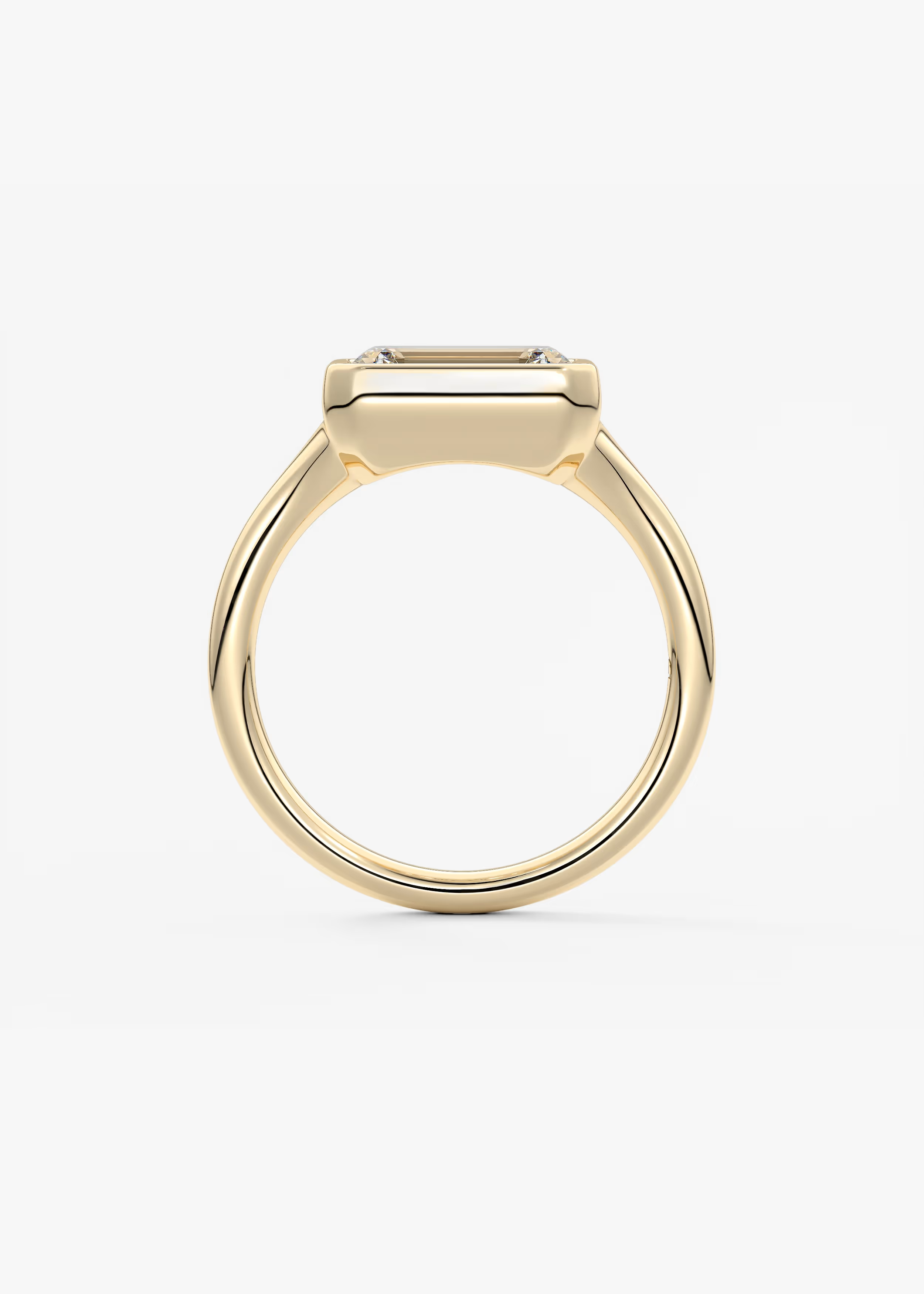East-West 2 Carat Emerald Bezel Solitaire Ring