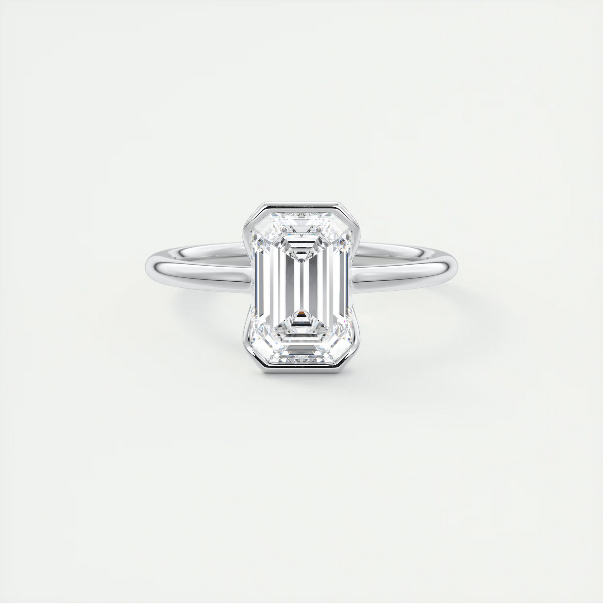 2 Carat Half Bezel Emerald Solitaire