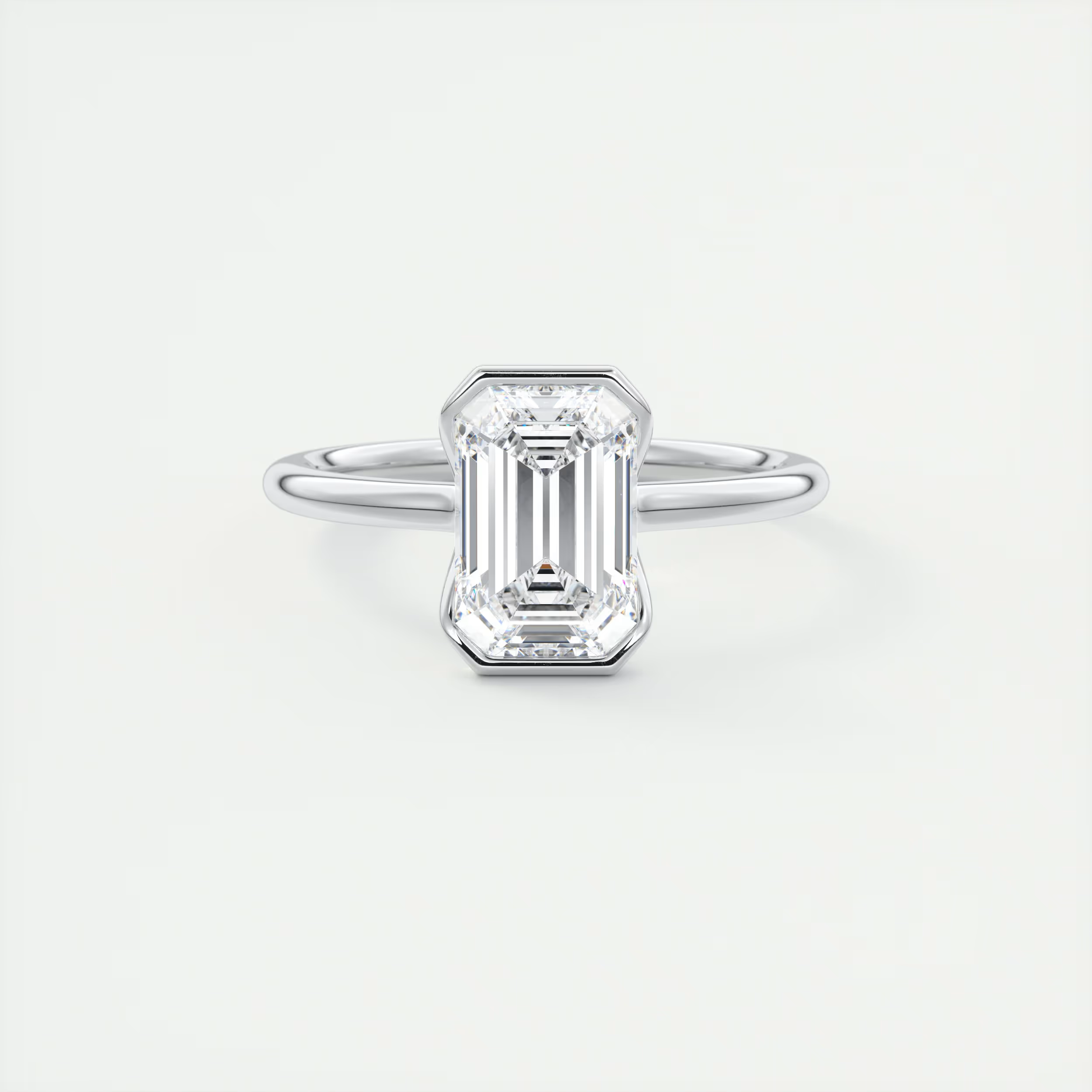 2 Carat Half Bezel Emerald Solitaire