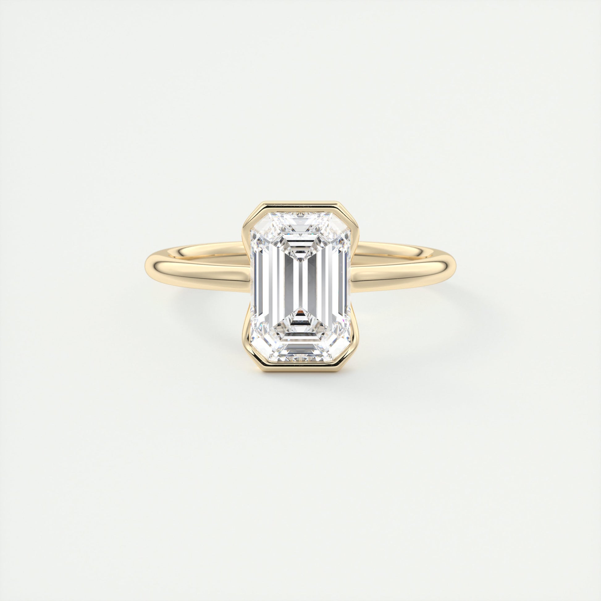 2 Carat Half Bezel Emerald Solitaire