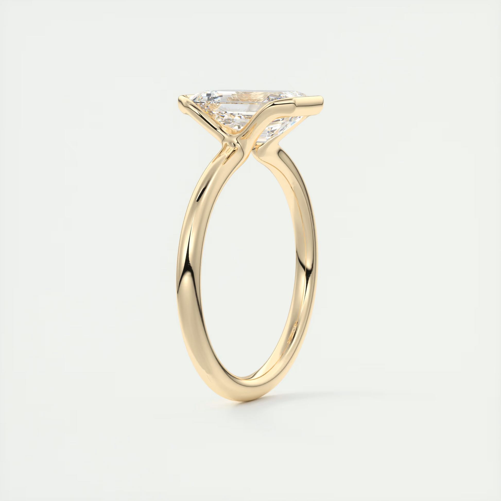 2 Carat Half Bezel Emerald Solitaire