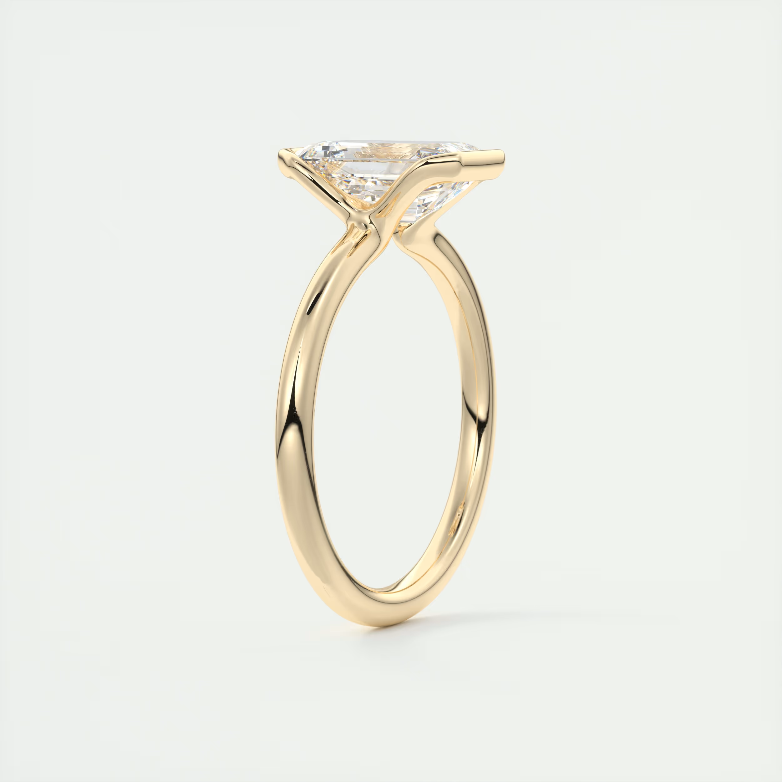 2 Carat Half Bezel Emerald Solitaire