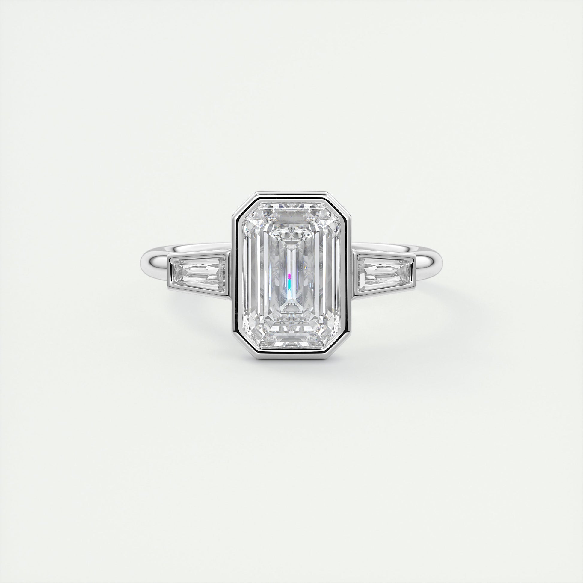 Architectural 2 Carat Emerald & Baguette Three-Stone Bezel Set Engagement Ring