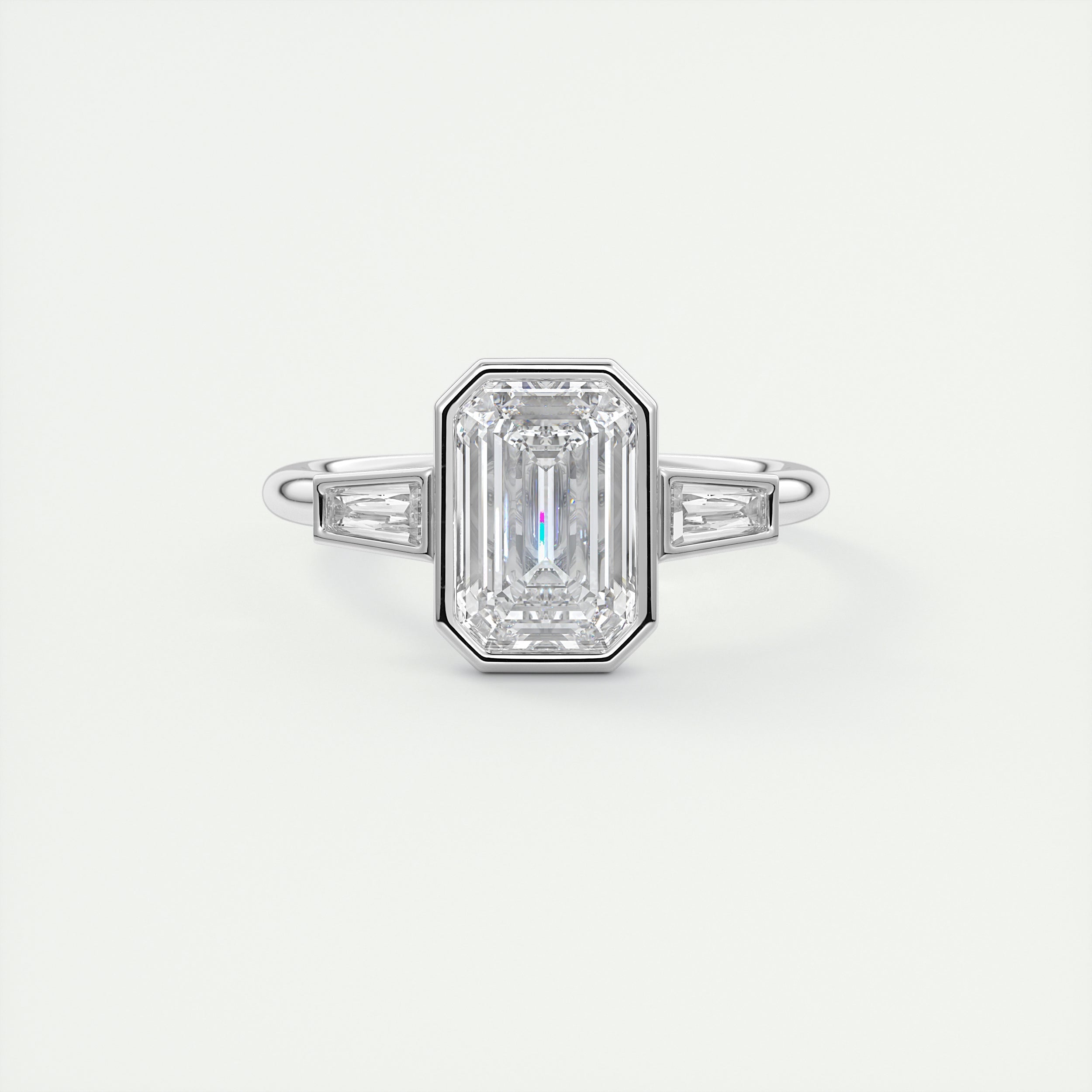 Architectural 2 Carat Emerald & Baguette Three-Stone Bezel Set Engagement Ring