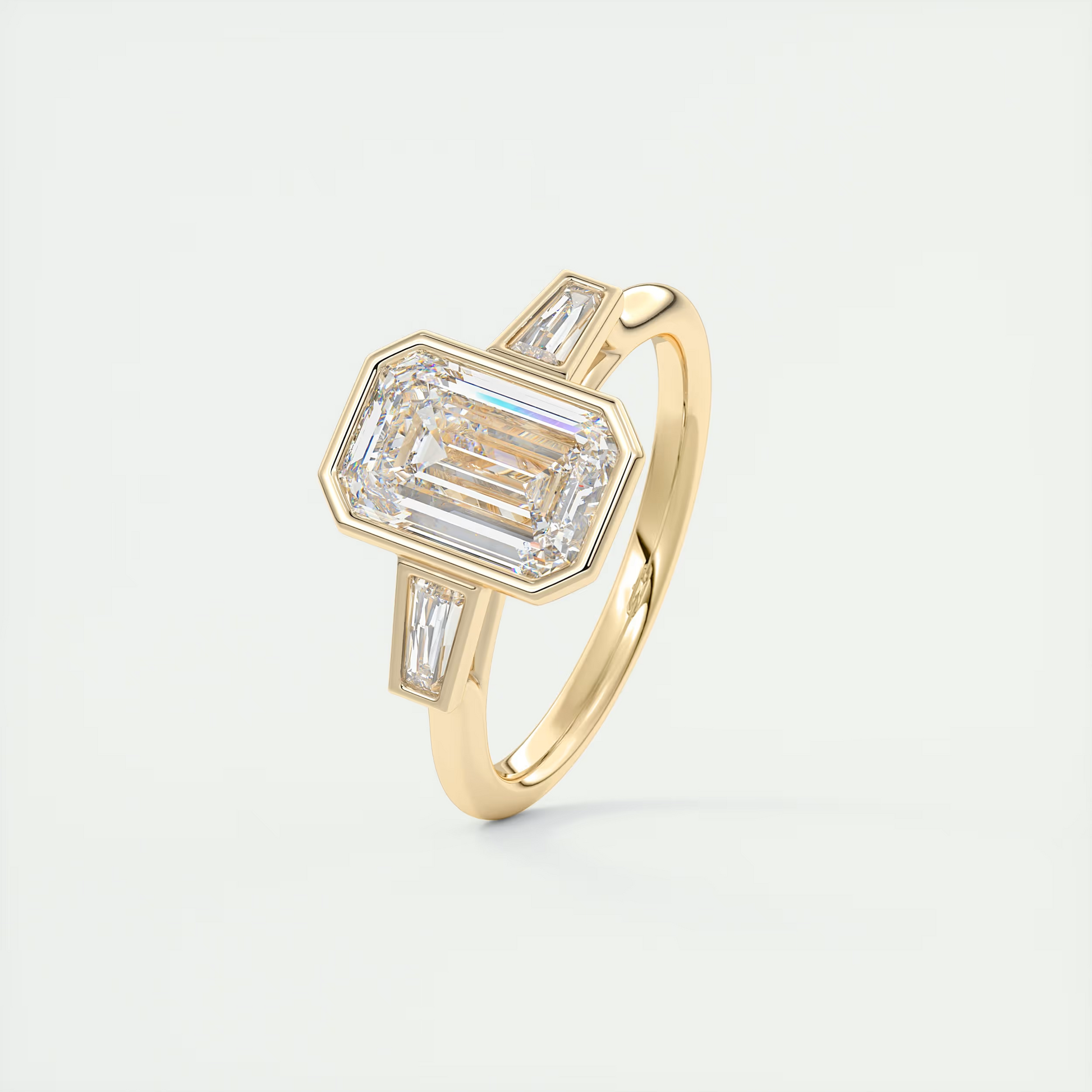 Architectural 2 Carat Emerald & Baguette Three-Stone Bezel Set Engagement Ring