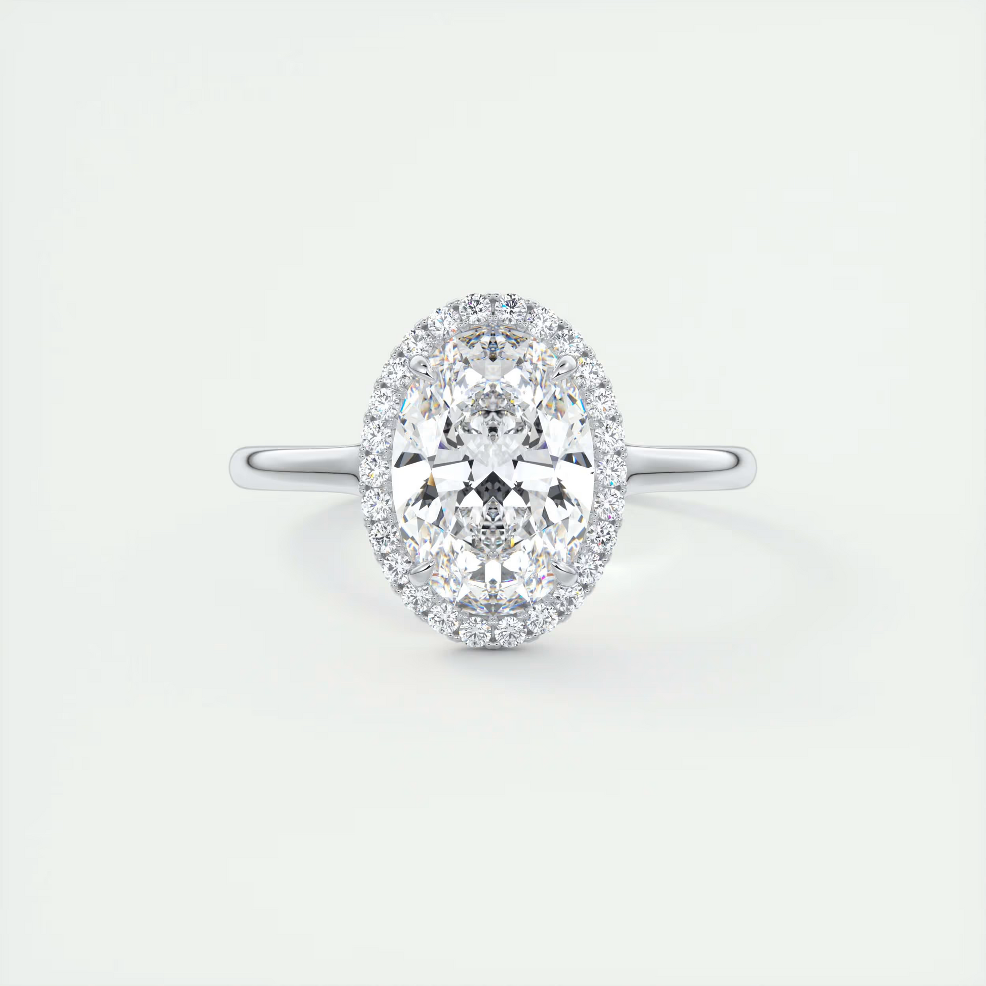 Slim 2 Carat Oval Center with French Set Halo