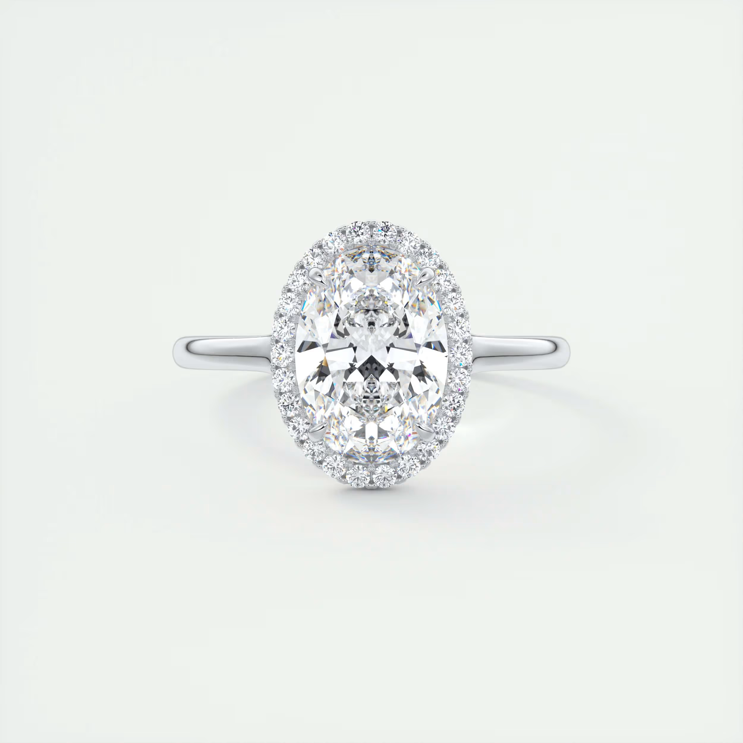 Slim 2 Carat Oval Center with French Set Halo