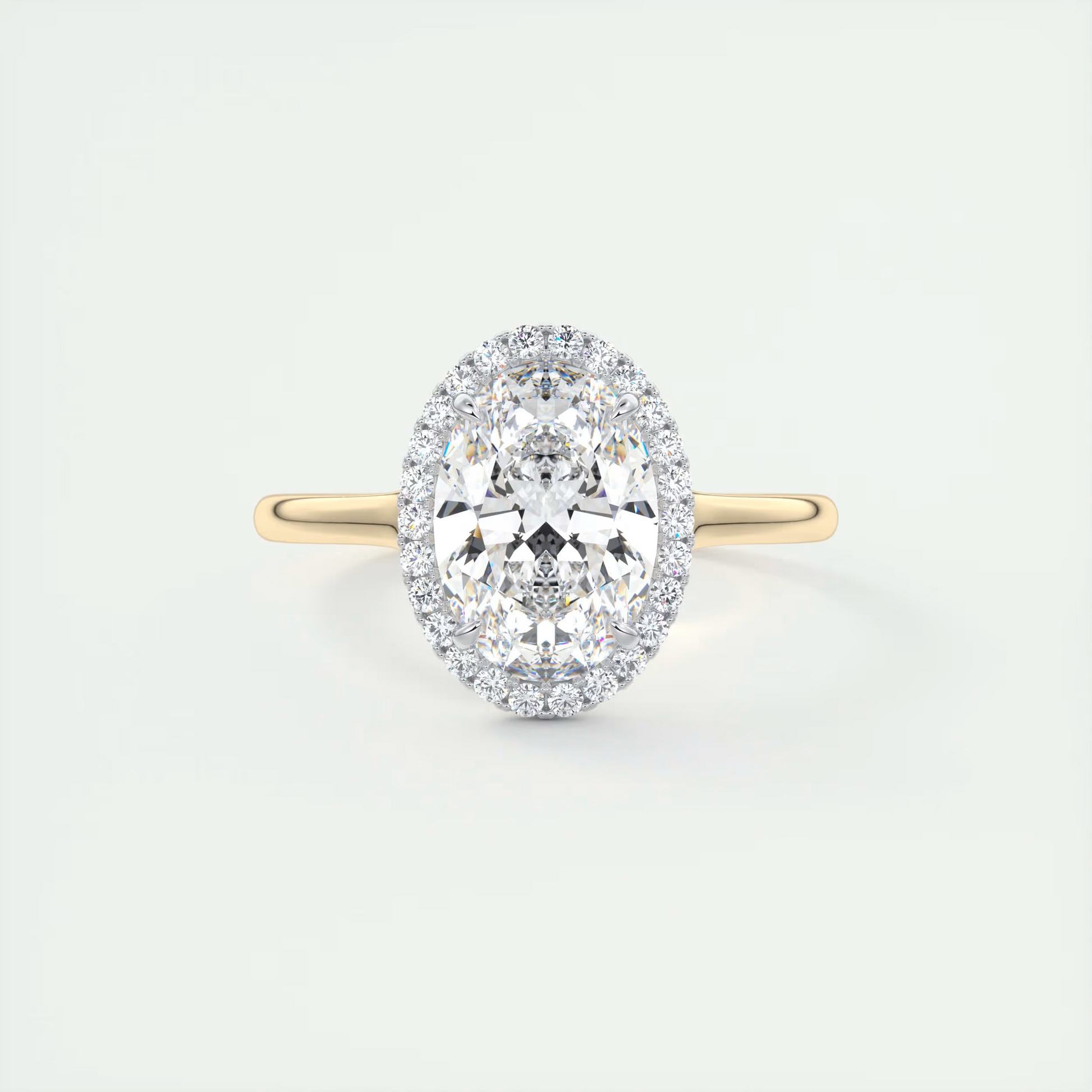 Slim 2 Carat Oval Center with French Set Halo